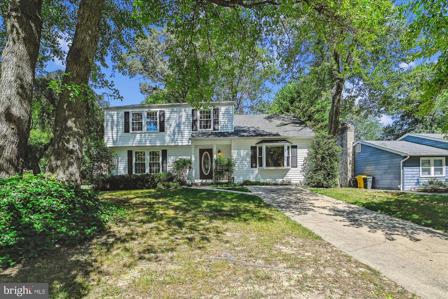 Welcome home to this great five bedroom two and a half bath home nestled in Riverdale of Severna Park. The property is in turn key condition with an upgraded kitchen wonderful soft close cabinets, granite countertops, dining space island, stainless appliances, and bamboo flooring. The dining area off the kitchen has the same bamboo flooring, and a slider leading out back to a deck and patio to entertain within the spacious fully fenced yard. To the other side of the kitchen find the primary bedroom suite, with a fantastic full bath with soak tub and step in shower, and the laundry on the main level for convenience.  Upstairs are four newly carpeted bedrooms, and the upper level primary has two closets (one could become a bathroom). The basement is a clean slate, open for storage or to be finished for more living space.***Shed conveys as-is*** Close to commuter routes, shops and restaurants, a perfect location to call home. This one won't last long.