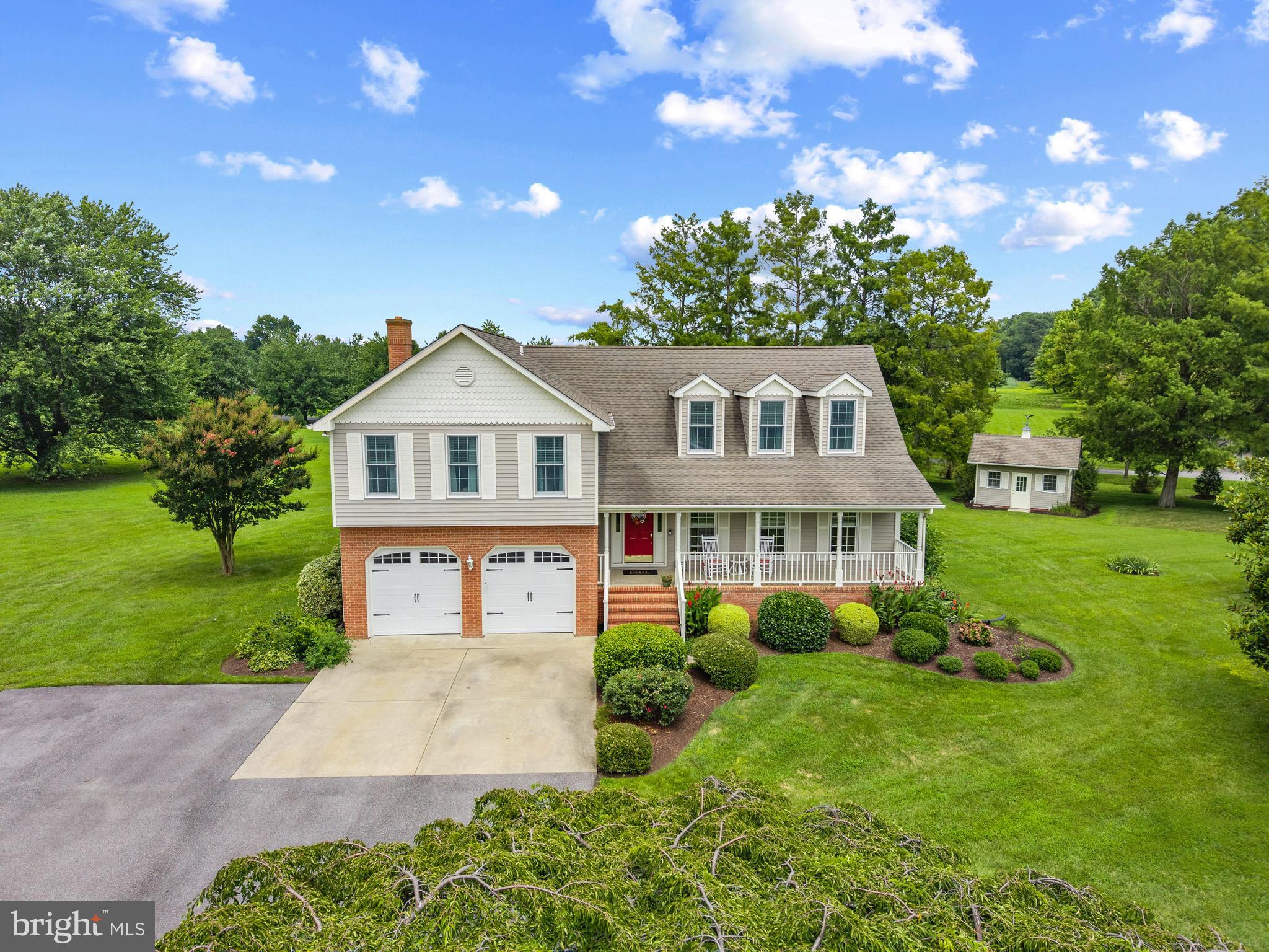 Welcome to 162 Kirwans Landing Lane—a beautifully updated residence located in the sought-after, water-privileged community of Kirwans Landing. Set on 1.4 private acres, this 4-bedroom, 2.5-bath home offers a seamless blend of refined comfort and exceptional outdoor living.
Inside, you’ll find hardwood floors throughout both levels, a renovated kitchen with granite countertops, custom white cabinetry, and stainless steel appliances. Recessed lighting adds a soft glow to the main living areas, while a gas fireplace anchors the living room with warmth and elegance. The sunroom, finished with tile flooring and surrounded by windows, provides a light-filled space for year-round enjoyment.
Upstairs, the spacious primary suite features a peaceful sitting area, two walk-in closets, and skylights that bathe the space in natural light. Three additional bedrooms share a well-appointed full bath. Additional features include a central vacuum system and thoughtful updates throughout.
Step outside to your private retreat: a saltwater pool, expansive patio, and extensive hardscaping surrounded by mature, lush landscaping—ideal for entertaining or quiet relaxation. A 90-foot private pier offers direct water access for boating, fishing, or simply soaking in the views. Residents also enjoy access to the community marina, making this a truly rare offering that balances lifestyle and location.