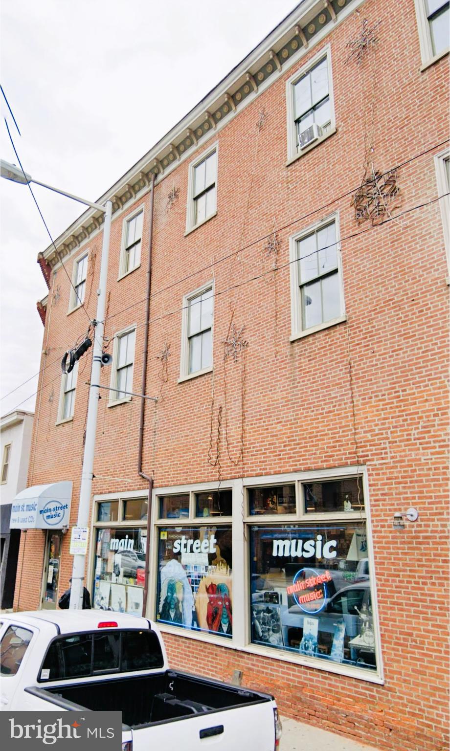 Welcome to 4444-48 Main Street in beautiful Manayunk! Whether you are new to Manayunk or a life-long resident, you will enjoy this location. The property backs up to the Manayunk Canal and is literally 300 ft from the train station! A gorgeous 3-story solid brick structure featuring commercial tenants on the first floor and 2-story apartments above. The offered apartment, Unit "B", features gorgeous and rustic wood flooring, exposed brick walls, beautiful granite countertops in the kitchen opened up to spacious dining and living room. The 2nd level of the apartment features a large main bedroom and a 2nd bedroom with views of the beautiful canal and a complete 3-piece tile hall bath with a built-in laundry complete with washer and dryer! Unit also features huge windows, gas cooking, gas heat and central air! This unit will not last long! Make your appointment today! Immediate possession! Interior photos coming soon!
