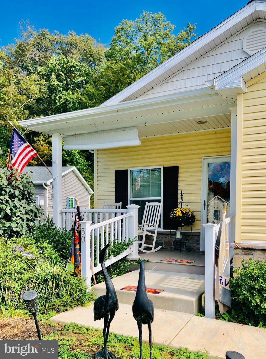 This Kingsley builder model has tons of charm and many extras: Granite countertops in kitchen and main bath, crown mouldings, oversized garage, gas fireplace, covered front porch, backs to private wooded area in a no thru street. The sale of 50 Admirals Way is for a manufactured home only, land is not owned by owner and is subject to ground rent, which includes sewer, trash collection, snow plowing, club house use and activities. Buyer must be approved by manager of Cecil Woods. This is a 55+ community that is in high demand!