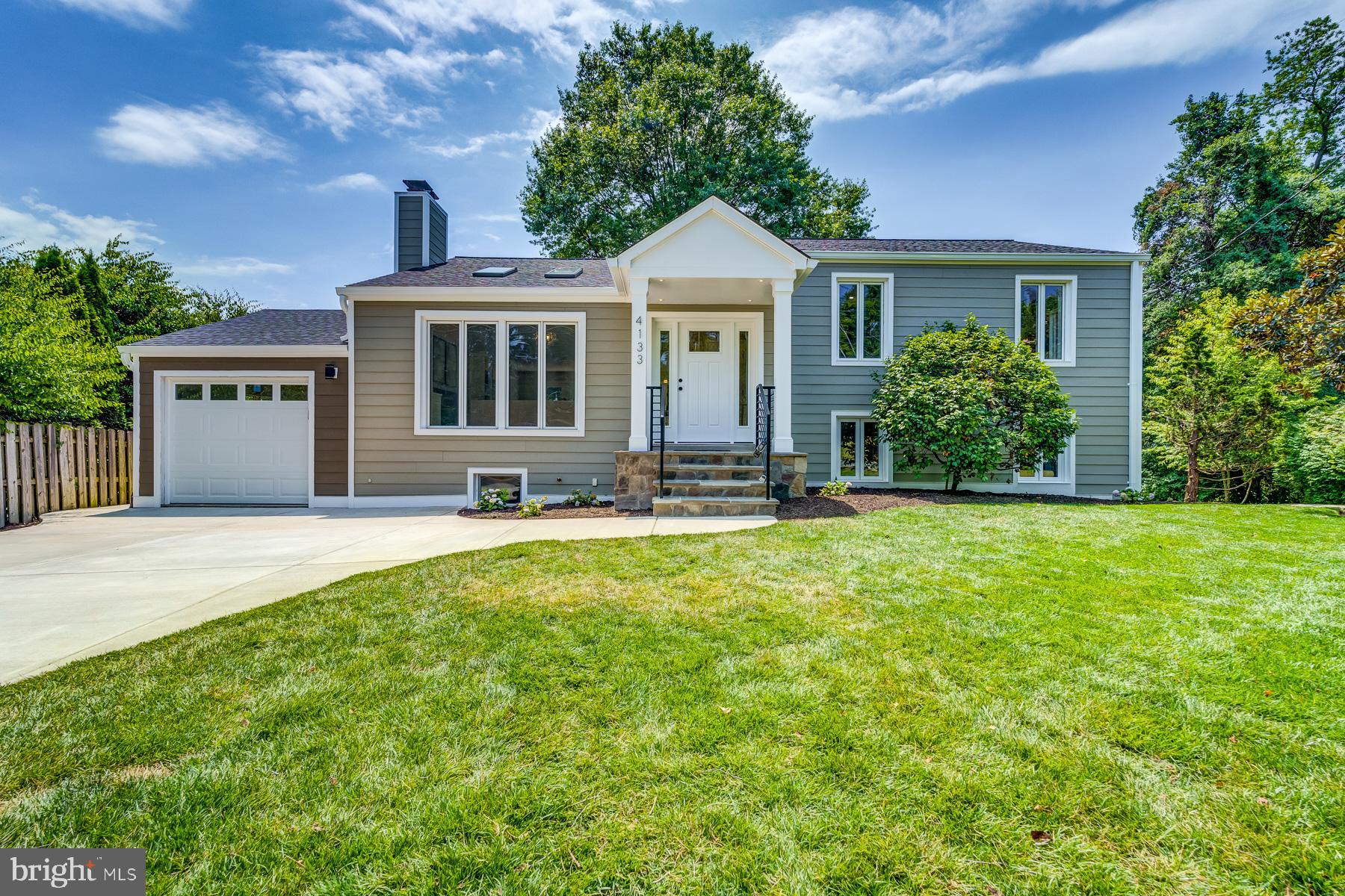 Welcome to this stunning, completely remodeled 4-bedroom, 3-bathroom single-family home in highly sought-after North Arlington. Spanning over 3,000 square feet across 4 levels, this modern residence sits on a .23-acre lot. The home offers an open floor plan perfect for entertaining. Inside you will find hardwood floors, recessed lighting, and a wood-burning fireplace.
The gourmet kitchen is equipped with quartz countertops and stainless steel appliances. The spacious primary bedroom boasts his and her walk-in closets, a luxurious on-suite bathroom, and a private deck. The expansive lower level recreation room comes with a wet bar, wine fridge, additional bedroom, full bathroom, and a walkout to your private flagstone patio.
This home has undergone a long list of improvements to highlights include a one-car garage with ample storage, Trek deck and an additional lower level. All the appliances, the washer/dryer, HVAC system, water heater, roof, hardie plank siding, french drain, sky lights, garage door and driveway are all brand new. Fresh paint throughout adds to the home's impeccable appeal.
Situated just steps from Glebe Road Park and Fort Ethan Allen Park, and a short drive to DC, Chevy Chase, and Bethesda, this home offers both convenience and luxury.