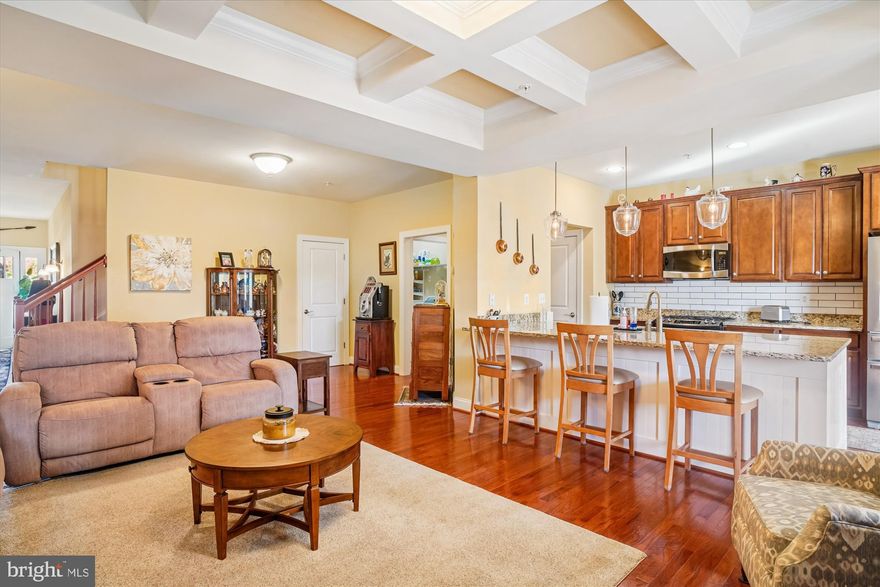 WOW! Discover a  perfect blend of comfort and convenience in this unique available end unit  villa, nestled within the sought-after 55+ community of Castlefield. This beautifully maintained home features 3 spacious bedrooms, 3 updated baths, and an  over sized attached 2-car garage. This Villa  offers  ample space for all your comfortable living plus more. Once you are  inside your buyer will  find a fully upgraded  top of the  line kitchen with  all modern  touches, perfect for preparing meals and entertaining since it is  a completely open  concept floor plan . It  flows seamlessly into the coffered ceilings  living room  and dining room area. Property offers tons of natural light from the surrounding windows and all recess lighting  making  this home  standout  out  on his own. Beautiful hardwood floors, and full of upgrades such has  coffered ceilings  granite counter tops, upgraded lighting and much more. Out back in the deck is   ideal space to relax and enjoy the outdoors . Additionally,  3rd level offers a complete in law-suite w/ a  bonus room ,  and  an additional flexible space that can be used as a home office, hobby room, or anything  else a buyer might need. This  villa is equipped with a New hot water heater, Back-up generator and many more upgrades throughout, ensuring year-round comfort. The first-floor layout includes a laundry room and an additional  bedroom suite with   New remodeled  bath walk-in shower and handrails for added safety and accessibility.  Lower  unfinished level offers plenty of storage , a rough in bath and a full workshop area. Don't miss your chance to own this exceptional home in Castlefield . Please Schedule your private tour today and experience the best of 55+ living!