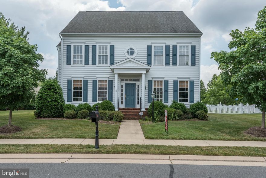 Motivated sellers!  4BR Upper level, 1 BR suite w/bath off kit area, perfect for inlaws, au pair or guest rm.  HW on main level and MBR.  Kit backsplash and granite counters, fam rm off kitchen allows max. entertaining.  LL finished with walk up- and FB in LL.  BR's are spacious and lite filled.  All offers will be considered!  Low maintenance lot