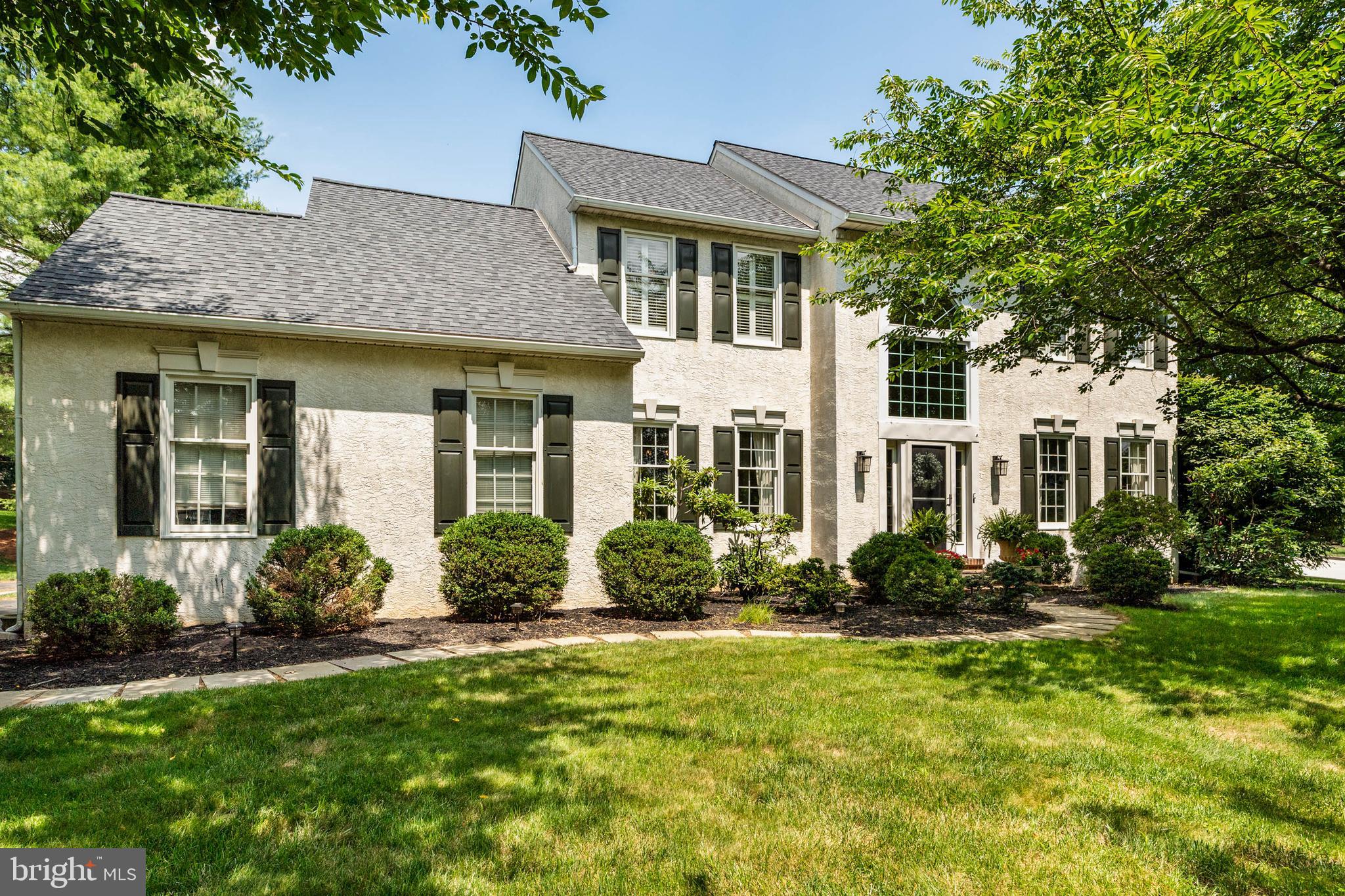 Welcome to 1701 Adler Lane, Malvern a stylish colonial situated in the desirable Summerhill neighborhood in the top rated Tredyffrin-Easttown School district. Built in 1994, this home has been lovingly cared for and thoughtfully expanded and updated with timeless style and functional layout. You are welcomed into a bright open foyer flanked by the dining room on the left and living room on the right. The sunny living room has French doors leading to the home office and an exterior door to the covered side porch. The formal dining room leads to the updated, bright white kitchen with granite counters, an expanded island accommodating seating for 5, a double oven, 5 burner gas stove, and access to a bright mahogany solarium with exterior access to a paver patio. A spacious 2-story addition greatly expanded the casual dining and family room areas, with numerous windows, updated millwork, a gas fireplace and a charming, covered porch providing shaded, outdoor space and lovely curb appeal. This additional space allows for seamless flow for entertaining family and friends. Rich hardwood floors, updated millwork, neutral colors and an abundance of natural light are notable features on the main level. Heading upstairs, the addition expanded the second floor from 4 bedrooms 2 baths to 5 bedrooms and 3 baths with additional common area outside the secondary bedrooms. The primary bedroom includes a sitting room, walk in closet and a beautifully updated primary bath. The 4 other spacious bedrooms include ceiling fans and nicely sized closets. One full bath has a double vanity, and the 3rd full bath has 3 separate vanity areas and a separate shower/toilet room for added privacy. The finished basement offers an open common area for an additional TV room, game room or office space, a 6th bedroom for a nanny, in-laws or older child, full bathroom, exercise room, and both finished and unfinished storage areas. The Summerhill community offers walking trails and a low HOA fee that covers the maintenance of common areas. Conveniently located near nature trails, Valley Forge Park, major commuter routes, the King of Prussia Mall, and the vibrant dining and entertainment options along the Main Line.