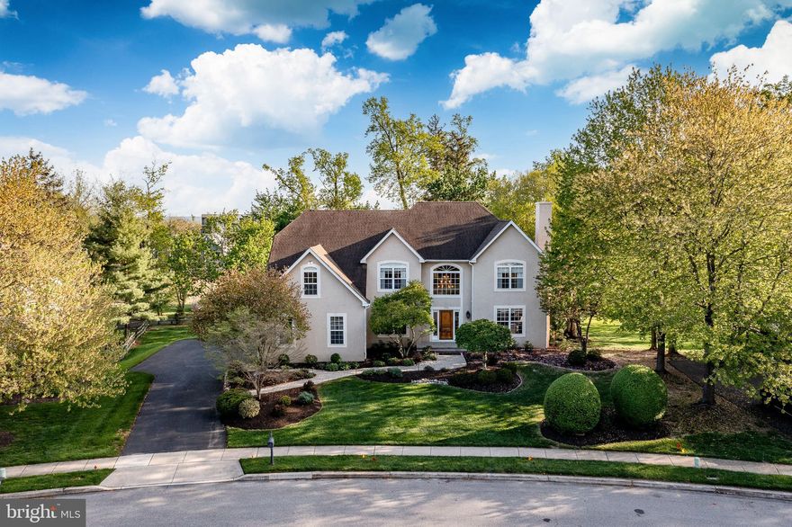 Welcome to 705 Lake Drive in Ambler - You are welcomed by the manicured front gardens and beckoned down the pathway to the inside where layout, upgrades, and a beautiful quiet yet convenient location come together seamlessly. This updated 4/5 bedroom, 4.5-bath home offers the perfect blend of comfort and functionality in a highly sought after and walkable location.
A dramatic two-story foyer sets the tone upon entry, complemented by both an elegant front and back staircase for ease and flow and beautiful hardwood floors and moldings. A private home office with French doors and custom built-ins, provides the perfect space for remote work or quiet study. The bright, open layout is highlighted by a light-filled family room with vaulted ceilings with skylights, a gas fireplace, and wet bar, creating a bright and airy inviting atmosphere ideal for everyday living and entertaining.
The updated gourmet kitchen features quartz countertops, high-end stainless steel appliances, a seated island, ample custom cabinetry, and a layout designed for both daily living and effortless entertaining. The kitchen opens to a breakfast room where glass doors open to an expansive deck overlooking trees, gardens and a serene walking trail - perfect for morning coffee, outdoor dining, or simply enjoying the peaceful natural setting.
The large formal living room has a gas fireplace with a stunning antique mantel surround and the spacious dining room with butlers pantry allows for effortless entertaining, offering the perfect setting for gatherings both intimate and grand.
Upstairs, the spacious primary suite offers a true retreat with multiple large custom outfitted walk-in closets and a luxurious updated en-suite bath complete with a soaking tub, double vanities, and a walk-in shower with frameless glass doors and custom tile work. A second bedroom suite includes its own private updated full bath with custom tile work, while two additional bedrooms share an updated hall bath with double vanity, and tub/shower combo providing a functional and flexible layout for family and guests.
The walk out finished lower level adds exceptional living space, featuring a dedicated home theater along with additional room for a gym, playroom, or lounge.  A beautifully renovated full bathroom with tub/shower combo and bonus room currently a bedroom adds to the versatility of the lower level.
With its scenic backdrop, thoughtful layout, and extensive updates throughout, this home offers a rare opportunity to enjoy privacy and comfort just minutes from everything Ambler has to offer. Just a 15 min walk to vibrant downtown Ambler, a lively walkable town with acclaimed dining, shopping, and cultural attractions including the historic Ambler theater. Close to Upper Dublin High School and Fort Wash Elem making daily routines simpler. Close to parks and trail amenities, Mondauk Common’s 1 mile walking track trails and playgrounds, Upper Dublin’s trail and park system. The borough’s revitalized streetscape and strong sense of community offer a lifestyle that blends charm with modern convenience.
Equally compelling is the home’s proximity to the iconic Mattison Estate, a landmark property that enhances the surrounding area’s character, architectural integrity, and long-term desirability.
For commuting professionals, the location provides efficient access to Center City Philadelphia, major corporate corridors, and regional rail service—supporting a seamless balance between career and home life.
