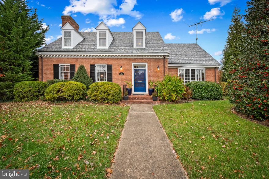 Beautifully maintained  brick Cape Cod with a coveted first level primary suite and a spacious 2-car garage and covered access to the home via a screen porch.  Offering 3 bedrooms, 2 full baths and 2  updated half baths,  and so many comfortable, spacious living areas on all levels.  The large living room has a wood-burning fireplace, a formal dining room offers two corner cabinets, and the very spacious kitchen is complete with a large island and breakfast bar, stainless steel appliances and ample, beautiful cabinets throughout. The first level primary suite has an updated en suite bath and is adjacent to a gorgeous library/family room  with beautiful built-ins and can also serve as a great home office.  The upper level has two bedrooms, another full bath, two cedar closets and a wonderful walk-in attic  which could be easily renovated for additional living area or used as is for convenient storage.  Last but not least, the renovated and lower level is a surprise with a great recreation, fitness or family room along with a bright laundry center with more storage and an earmarked craft area.  The rear yard is lovely for gardening and entertaining. This is home which has to be seen in person to fully appreciate! Easy access to the home via the one of two lanes off of Northern which connect you to the home's large driveway.