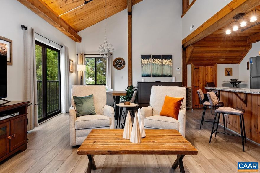 A very rare oversized one-bedroom, two-full-bath condo in the Mountain Inn neighborhood. This condo offers the single largest unit in the building. It features 950 sqft of living space with a 1.5-story floor plan. The main level has a huge living room, a full-size kitchen that is open towards the living room, and a dining area. There is also a powder room on this floor. The upper level has an enormous bedroom with a walk-in closet and a large full bathroom. Located in a private wing of Mountain Inn Lodge, you will find peace from the Lodge traffic here. Find all conveniences in the Lobby of the Mountain Inn Lodge, like a coffee shop, a comfortable lounge with a fireplace, a sports goods store, and a boutique. The Edge and Copper Mine restaurants are only steps away, and skiing is in your backyard. You won't find a more central location than this. The condo, rated Platinum, is on the Wintergreen Resort Rental Program and generates a solid rental income. Conveys turn-key furnished.,Granite Counter,White Cabinets