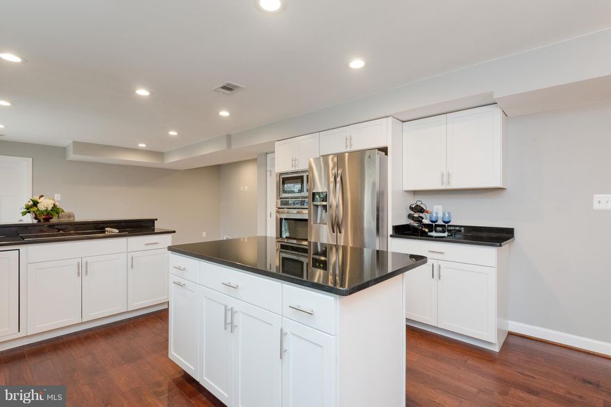 BEAUTIFULLY RENOVATED COLONIAL !!!  THE SELLER HAS SPARED NO EXPENSE.  KITCHEN WITH DOWN DRAFT COOKTOP, WALL OVEN/MICROWAVE, FRENCH STYLE REFRIGERATOR WITH WATER AND ICE ON DOOR, ALL STAINLESS  WITH CLASSIC GRANITE, AND TOP IT OFF WITH ISLAND AND BREAKFAST BAR!  SPACIOUS MASTER BEDROOM WITH WALK IN CLOSET AND MODERN STYLE BARN DOORS BATHROOMS BOAST WITH STYLE AND DESIGN! OPEN FLOOR PLAN , TRULY A MUST SEE TO BELIEVE