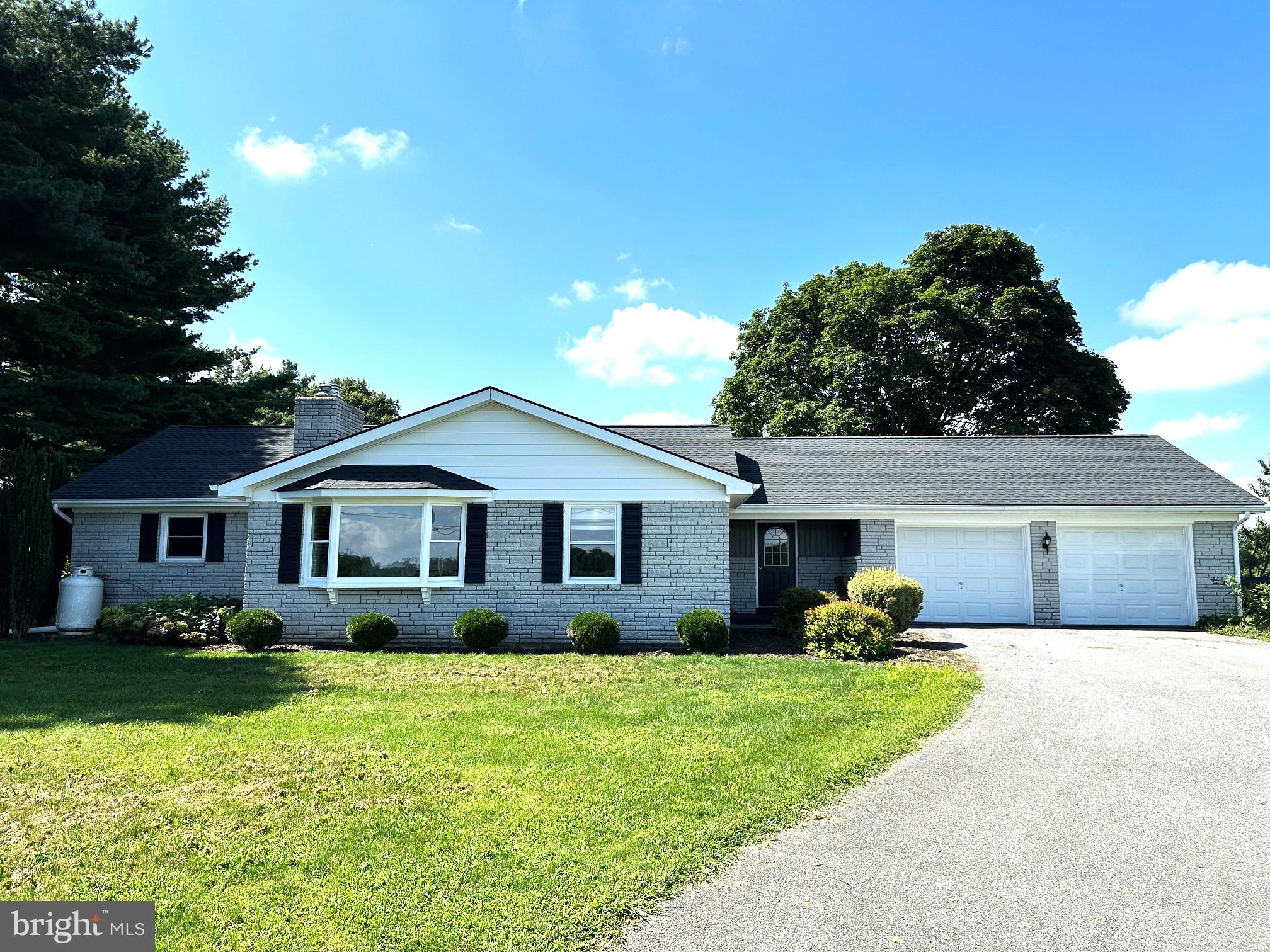 For Rent – Spacious 3 Bedroom, 2 Bath Ranch on 55-Acre farm. Rental address is 4225 Newark Rd, Oxford PA 19363
Enjoy peaceful country living in this well-maintained ranch home, beautifully situated on a 55-acre farm in southern Chester County, just minutes from Routes 10 and 896. This rare rental opportunity offers both comfort and privacy in a serene farm setting. This brick and vinyl home is move-in ready and offers a flexible floor plan. Pets are accepted with restrictions.
Main Level: Bright family room with propane fireplace, living room or large dining area, eat-in kitchen, 2 bedrooms, full bath, laundry, and welcoming entry foyer.
Lower Level: Additional family room with propane fireplace, 3rd bedroom, full bath, storage space, and walkout access to the rear yard.
Additional Features: Attached 2-car garage. Large rear deck overlooking open farmland. Spacious yard with beautiful views on all sides
Tenants are responsible for utilities (no water or sewer bills – property has a well & septic). No central air conditioning. Heat is ceiling electric radiant. Rental application and verifications required. Immediate occupancy available. Open house on Thursday, September 4, from 4:30 pm to 6:30 pm.