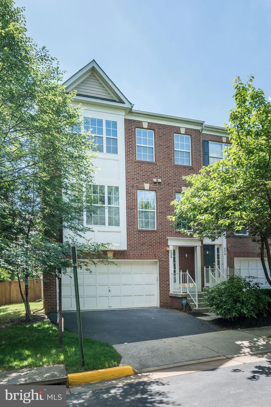 Stunning 3 bed/ 2 full ba, 2 half ba, 2 car garage end-unit TH in sought after Fair Lakes Court! Gorgeous wide plank HW floors throughout the whole ML. Gourmet kitchen w/ new SS appliances. Brand new carpet in LL and UL. New paint throughout all 3 levels!  Deck, patio and mature trees surround this home, making it great for entertaining. Close to shopping, restaurants & entertainment.  Don't Wait!