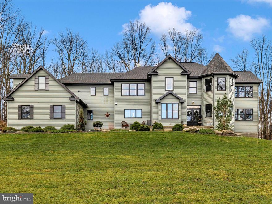 Welcome to Mountain View Farm. This wonderful custom built home on 10+ acres is positioned to take full advantage of amazing views and incredible privacy. This 7000 square foot home has 5 oversized bedrooms and 5.5 luxury baths. The gourmet kitchen has a massive center island that directs your eyes to a million dollar view of the Catoctin Mountains. The main level boasts a two story family room with floor to ceiling windows, private dining room, butler pantry area, walk-in pantry, family foyer mud room by the garage, large laundry room, luxury owner's suite with private door to the patio, custom hardwood floor and tile throughout and an extra deep, three car, side load garage. The second level has four bedrooms, three baths and two private rec areas. The finished basement offers multiple flex rooms for crafts, hobbies, movies and entertainment, a bar, game room, office space, luxury bath and walkout access to the property. This is an opportunity to bring animals as the property has multiple fences and paddocks  for livestock. Call today to schedule your private showing. Do not enter the driveway without a scheduled appointment.