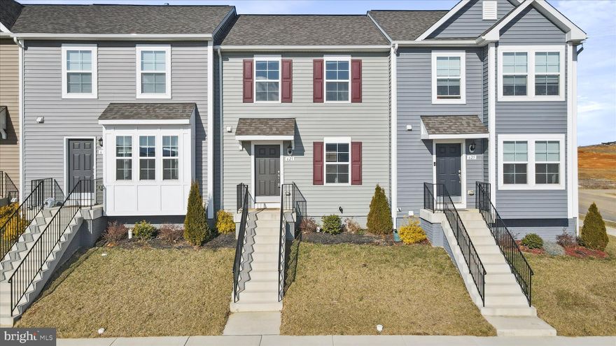 Nearly new 3-level townhome in the desirable Huntfield neighborhood! Move in ready--no need to wait for construction! Upgrades include an added sunny morning room, new fans, and upgraded refrigerator and kitchen cabinets. The entire main level is beautiful luxury vinyl plank flooring. The kitchen features quartz countertops and stainless steel appliances. The basement is finished with a recreation room and storage closet, along with another large storage room with a half bath rough in. The basement also features walkout stairs to the backyard and a tankless hot water. Upstairs, you'll find 3 bedrooms, 2 baths, and laundry (washer and dryer are included!). The home has its own driveway with room for two cars, and there is convenient access from that parking pad directly into the kitchen! Street parking is also available. 
And you'll have access to all of Huntfield’s wonderful amenities, including wide sidewalks, two playgrounds, tennis & pickleball courts, and upcoming community pool and basketball court. Location is conveniently close to downtown Charles Town and 340 for easy commuting to Martinsburg, Frederick, Leesburg, DC, and beyond. Schedule your showing today!