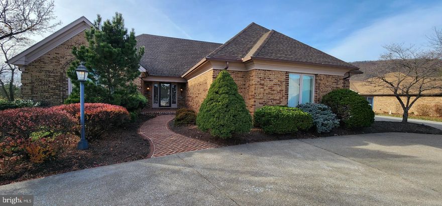 Nestled in the prestigious Forest Hills community, this exquisite traditional residence offers an unparalleled lifestyle defined by elegance and sophistication. Spanning an impressive 4,883 square feet, this meticulously maintained home is a sanctuary of luxury, perfectly situated on a 0.37-acre lot that adjoins a pristine golf course, providing breathtaking views and a serene backdrop for everyday living. The exterior is a masterpiece of design, featuring classic brick construction complemented by thoughtfully placed exterior lighting that illuminates the property at night. A circular driveway leads to an oversized side-entry garage, ensuring convenience and ample parking for guests. The lush rear yard invites outdoor gatherings, while the meticulously landscaped surroundings enhance the property's allure. Step inside to discover a harmonious blend of comfort and style, highlighted by a cozy fireplace that serves as the heart of the home. With four spacious bedrooms and four well-appointed bathrooms, this residence is designed for both relaxation and entertaining. The main floor laundry adds to the ease of living, while the additional storage area in the garage caters to all your organizational needs. Experience the ultimate in luxury living, where every detail has been thoughtfully curated to create a lifestyle of exclusivity and refinement. This is more than just a home; it's a gateway to a life of leisure, surrounded by the beauty of nature and the elegance of a golf course view. Don't miss the opportunity to make this exceptional property your own.