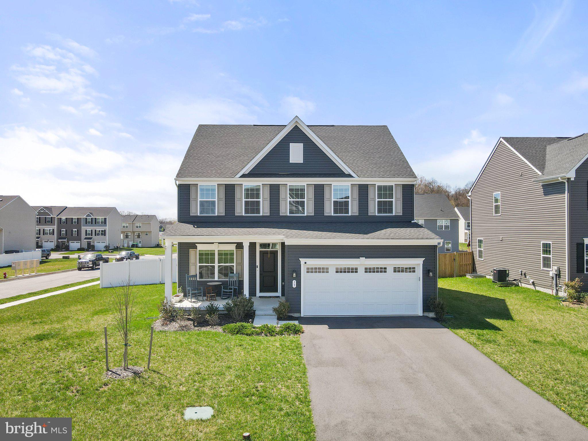 ***SATURDAY 05/03/2025 OPEN HOUSE IS CANCELED***Built in 2022 and gently lived in, 15 Machias Circle delivers that coveted new home feel—without the construction timeline. With over 3,000 square feet, 4 bedrooms, 3.5 baths, a dedicated home office, and a finished basement, this corner-lot Colonial checks every box for growing room and long-term comfort.
The main level balances openness with intention—bright, flowing living spaces designed for everything from weeknight dinners to weekend hosting. Upstairs, the primary suite is a true retreat, accompanied by three other ridiculously spacious bedrooms, while the lower level is ready to fit your lifestyle: guest space, play- or recreation room, gym—you decide!
Set in one of Martinsburg’s most quietly, convenient neighborhoods, this home offers the kind of square footage, layout, and curb appeal that feels rare at this price point.
Welcome to the upgrade you’ve been waiting for. Schedule your showing today!