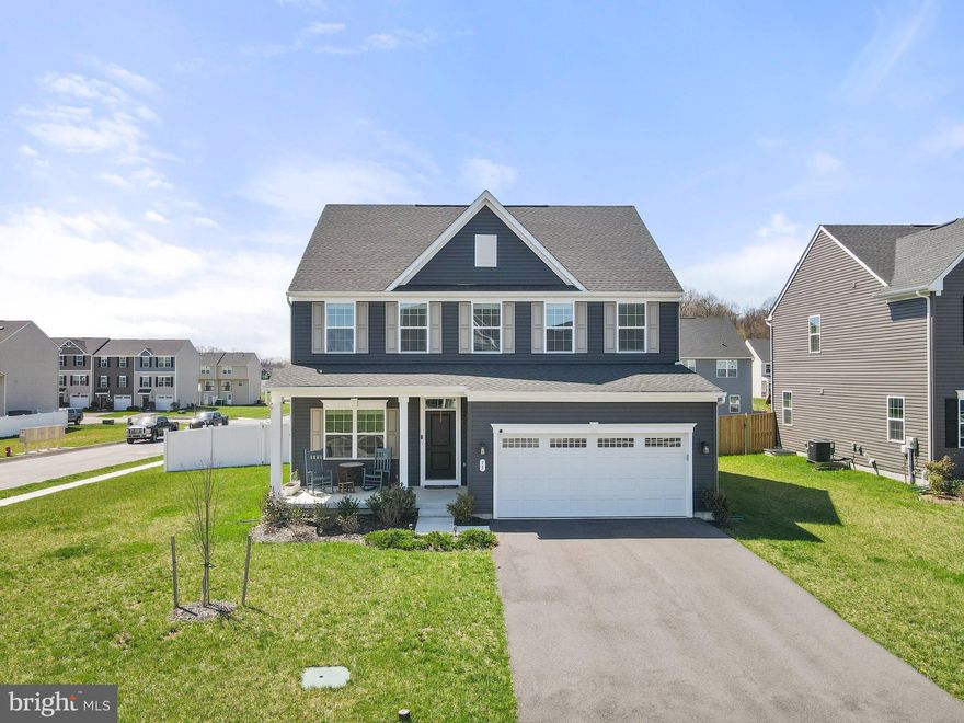 ***SATURDAY 05/03/2025 OPEN HOUSE IS CANCELED***Built in 2022 and gently lived in, 15 Machias Circle delivers that coveted new home feel—without the construction timeline. With over 3,000 square feet, 4 bedrooms, 3.5 baths, a dedicated home office, and a finished basement, this corner-lot Colonial checks every box for growing room and long-term comfort.

The main level balances openness with intention—bright, flowing living spaces designed for everything from weeknight dinners to weekend hosting. Upstairs, the primary suite is a true retreat, accompanied by three other ridiculously spacious bedrooms, while the lower level is ready to fit your lifestyle: guest space, play- or recreation room, gym—you decide! 

Set in one of Martinsburg’s most quietly, convenient neighborhoods, this home offers the kind of square footage, layout, and curb appeal that feels rare at this price point. 

Welcome to the upgrade you’ve been waiting for. Schedule your showing today!