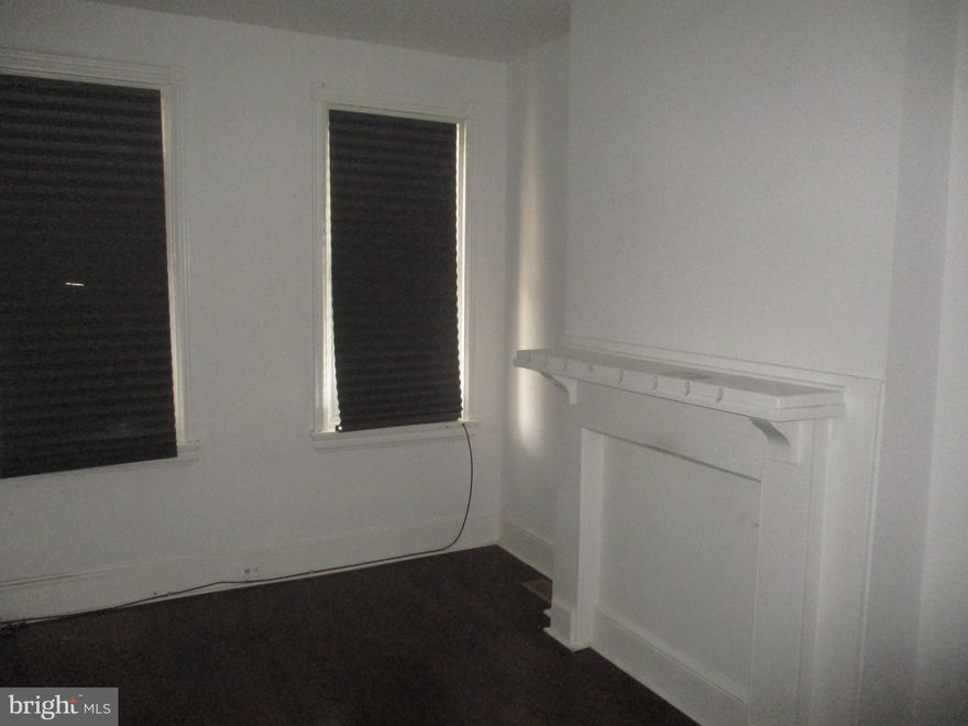 Brick front townhome with 3 bedrooms, one bath. Amenities include covered front porch, fenced yard, skylight,  basement, living room with mantle, and separate dining area. The front porch overlooks a  park. This property is eligible under the First Look Initiative.  All Owner Occupant offers will be responded to after 7 days on the market and Investor offers will be responded to after 30 days. However, all offers can be submitted during the First Look period.