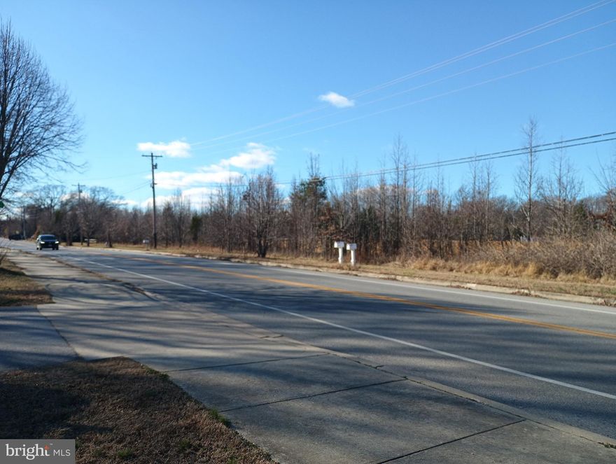 Attention builders, developers, investors, and future homeowners—this is a rare opportunity to acquire a wooded 5.8800-acre parcel (256,133 sq. ft.) with road frontage on two sides in the highly desirable Waldorf, Maryland area.

This property presents strong development and investment potential, featuring a buildable lot (buyers to perform their own due diligence). Zoning and land-use verification will allow buyers to align their plans with local regulations, making this an ideal setting for new construction, custom homes, or long-term land investment.

Enjoy the ideal balance of privacy and convenience, just minutes from shopping, dining, and everyday amenities, with easy access to major commuter routes including Routes 228, 210, and 301, and close proximity to Washington, DC and Northern Virginia.

Adding to its appeal, the property is strategically positioned among multiple additional land offerings, enhancing its potential for future expansion or phased development. The parcel is adjacent to approximately 9 acres in the rear, consisting of five (5) separate buildable lots, and is also across from an additional 4 acres comprising two (2) separate buildable lots.

This unique land configuration offers significant upside for builders and investors seeking scale, flexibility, or long-term appreciation. Whether your vision includes multiple custom homes, a boutique residential enclave, or land banking, the surrounding parcels add substantial value and opportunity.

All parcels are subject to buyer due diligence. Whether you’re looking to build, invest, or create a private retreat, this versatile property represents a rare land opportunity in a growing and well-located community.