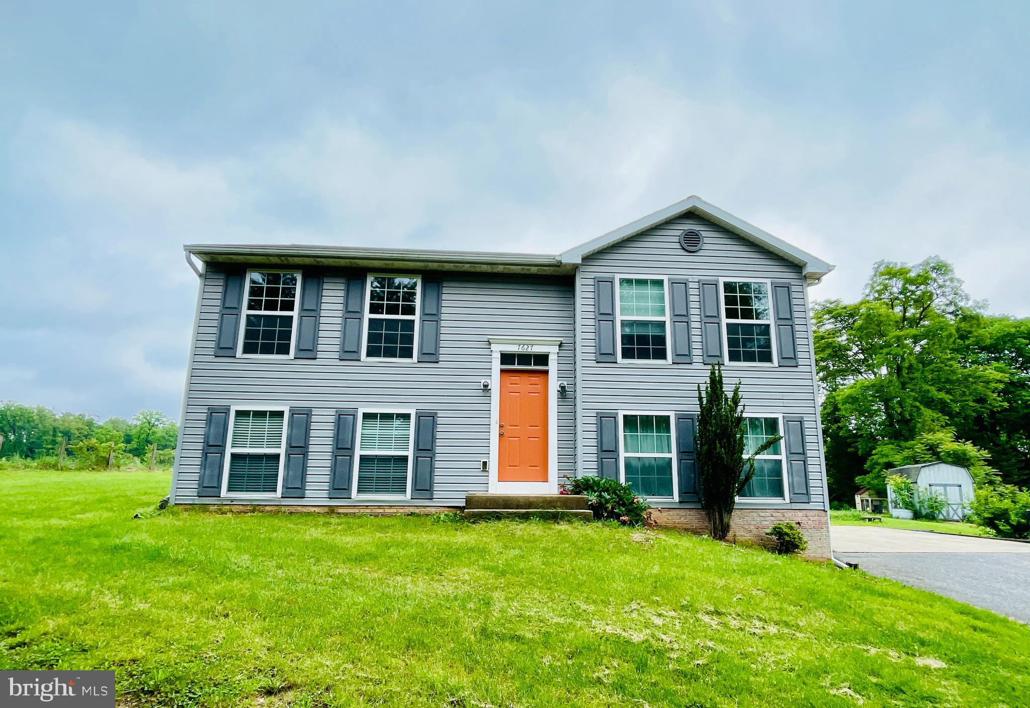 DON'T MISS THIS ONE !! Must see this split foyer home featuring a unique layout tucked away on a beautiful 0.76 acre lot. The home offers a great balance of privacy and community located in a quiet, rural area with easy access to I-70/I-81 providing quick access to schools, shopping, conveniences and commuting. The 4 bedroom, 2 full bath home offers plenty of space and comfort. The main level features LVP flooring throughout, a bright, open living area, a well-appointed kitchen with Quartz countertops, the owners' suite with walk-thru closet to a full bath with a custom tiled walk-in shower. Upstairs the home offers a spacious family room/loft, 3 generous sized bedrooms, a full bath, and laundry. Added bonus: the home recently had a fresh coat of paint throughout most of the home. Outside the back yard provides privacy with mature trees and blackberry bushes that will yield fruit in the summer. The large sheds add additional storage. The concrete patio is great for entertaining and connects to a 22x22 attached garage foundation offering plenty of parking.
Don't miss the chance to make this move-in-ready home yours !