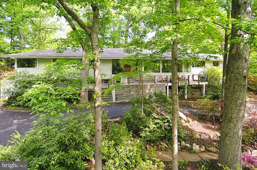 Fabulous Home in tranquil hill top setting in desirable close-in location. Over an acre of beautifully landscaped, abundance of privacy and nature,  Renovated with finest materials in 2009/2010.  The open floor plan invites grande entertaining+comfortable living on one level with superb Great Room, fantastic Kitchen, wonderful outdoor spaces to relax +enjoy.