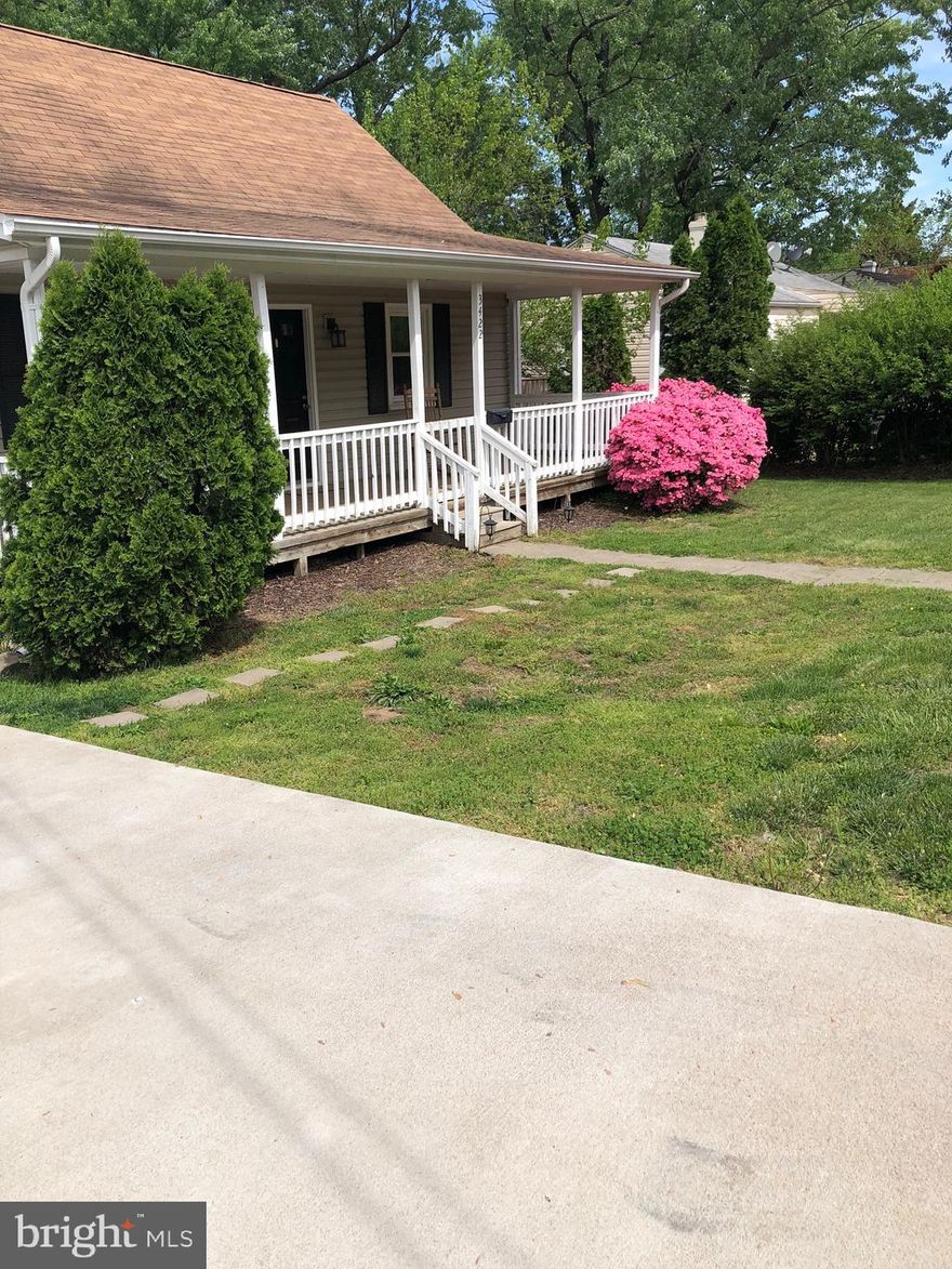 Fully renovated 3 Bed/1 Bath single family home with huge fenced-in backyard - perfect for dogs! Living room w/recessed lighting, hardwood floors throughout, Solid wood kitchen cabinets, stainless steel appliances, granite countertops, ceramic tile on bath. There is a lovely deck and a large front porch. 
One mile to Huntington Metro (walking path or bus steps from front door)