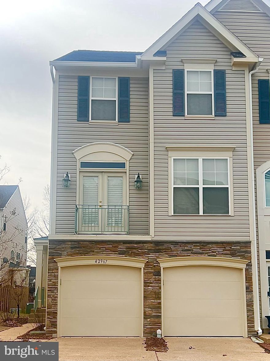 End unit rarely available in beautiful South Riding with world-class amenities.  2 CAR GARAGE 3 levels filled with natural light. Loads of usable outdoor space with a deck accessible from the kitchen and a brick patio in a fenced in back yard accessible from the cozy rec room. Gas fireplace. Great storage and a rough in for a 3rd full bath. Don't wait - this is the one. Make it your own. Photos coming soon. OPEN 1/31 and 2/1 2-4pm