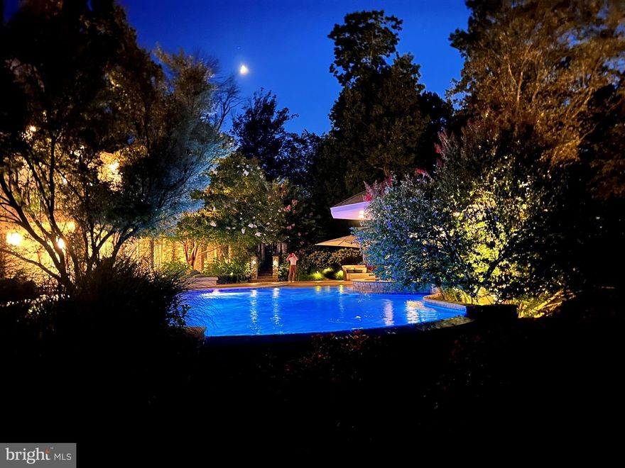Nestled on over 3.1 professionally landscaped acres on a private road in Gladwyne, Pennsylvania, sits a magnificent European styled residence that effortlessly blends chic, modern design with unparalleled amenities, further enhanced by an abundance of natural light and sleek, open floor plan.  A sprawling 12,000 square feet of living space, opens with a dramatic high ceiling foyer with glimpses of a flared staircase, living room and handsome, smartly detailed office.  As you make your way to the formal living room, a gas burning fireplace balances the space and exudes warmth and elegance. Ideal for entertaining, this space opens through three sets of French doors, leading to one of the home's many terraces. Here, one can enjoy breathtaking views of the property's truly exceptional resort level amenities, including a ‘best-in-class’ har tru, red clay tennis court, a beach-entry pool with a swim-up bar and grill/kitchen, tree-house with rope swing and an almost all glass cabana/zen pod complete with a kitchenette and full bath. Across from the living room and through a wide cased opening, the sense of spaciousness continues. The dining room, where a stunning stone wall merges chic aesthetics with an organic touch, creating an inviting atmosphere for gatherings and memorable meals. The heart of this home lies in its open floor plan, where the kitchen effortlessly connects with the soaring great room featuring a commanding fireplace, bar and separate dining area which overlooks a deep outside terrace. A perfect harmony of style and function, the kitchen boasts high-style modern wood cabinetry and seating for six or more, allowing for comfortable and intimate gatherings. For added convenience, the laundry and family entrance are located on this level, adjacent to the 3 car garage. Large format limestone flooring connects the living areas to the first level primary bedroom. Upon entry, one is greeted by an aura of space and tranquility. This retreat features not just one, but two luxurious en-suite baths, complemented by two thoughtfully outfitted walk-in closets. A staircase from the bedroom’s private terrace leads to the pool and hot tub, removing the need to leave the primary bedroom to escape for a late-night swim. Ascending to the upper level, one discovers two spacious lounge areas, perfect for relaxation and leisurely pursuits or as “bunk space’ for over-flow entertaining . Four generously proportioned bedrooms, each accompanied by an en-suite bath, await, with one recently updated to include a spacious sitting room, dining area and kitchenette. The lower level is a true retreat, offering a wealth of amenities designed to indulge and rejuvenate. A state-of-the-art fitness center awaits, ensuring that your wellness goals are always within reach. Adjacent to the fitness center, a massage room and spa bath complete with aroma and light therapy, providing a soothing sanctuary to unwind and revitalize the senses. For those seeking entertainment, the lower level offers both a game and arcade room. A large open TV viewing room invites you to relax and enjoy your favorite shows and movies in absolute comfort, while a well-appointed bar allows for the perfect gathering spot to socialize and share a drink. Steps away from this space and the gym, providing a shaded respite from the sun, an outdoor hot tub beckons, inviting you to soak in warmth and serenity. Adjacent to the hot tub, a wood-burning fireplace stands tall, casting a cozy glow as you unwind.    
With its seamless fusion of Miami flair and Mainline sophistication, this exceptional home offers a unique opportunity to live a life of elegance and active lifestyle. Whether enjoying the sun-drenched terraces, honing your tennis skills on the award-winning court, or immersing yourself in the beauty of the surrounding nature, this turnkey residence promises a lifestyle beyond compare.