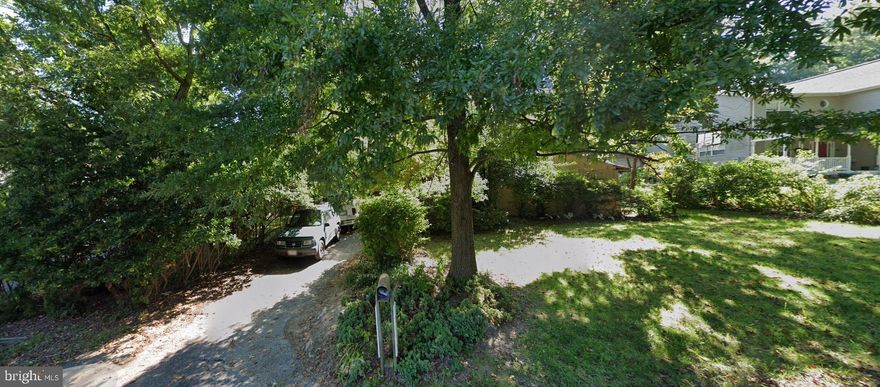 Almost 10k sq. ft. level lot close to Metro!  Tree-lined streets; great location.  Build your dream home with our builder or yours.  The price is for the lot only.  The existing home on the lot is not habitable.  Do not enter the existing home; structural and environmental conditions exist.