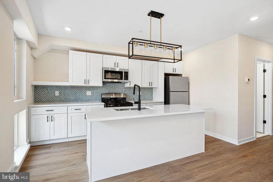 Welcome to 138 Tasker St, a brand-new construction building offering modern living at its finest. This beautifully designed unit features a spacious layout, hardwood floors, and high-end stainless steel appliances—including an in-unit washer/dryer, dishwasher, garbage disposal, microwave, and oven/stove. Enjoy sleek, contemporary bathrooms, and large windows throughout the unit that bring in abundant natural light, creating a warm and inviting atmosphere.  You are just steps from Dickinson Square Park and the Delaware River Waterfront, as well as tons of vibrant cafes and restaurants. Parking is available for just $150/month, a convenient price with I-95 just a few minutes drive away. Pets are welcome—cats with a one-time $350 non-refundable fee, and dogs with a $500 non-refundable fee (size and breed restrictions apply). Don’t miss the opportunity to live in one of Philly’s most desirable neighborhoods!