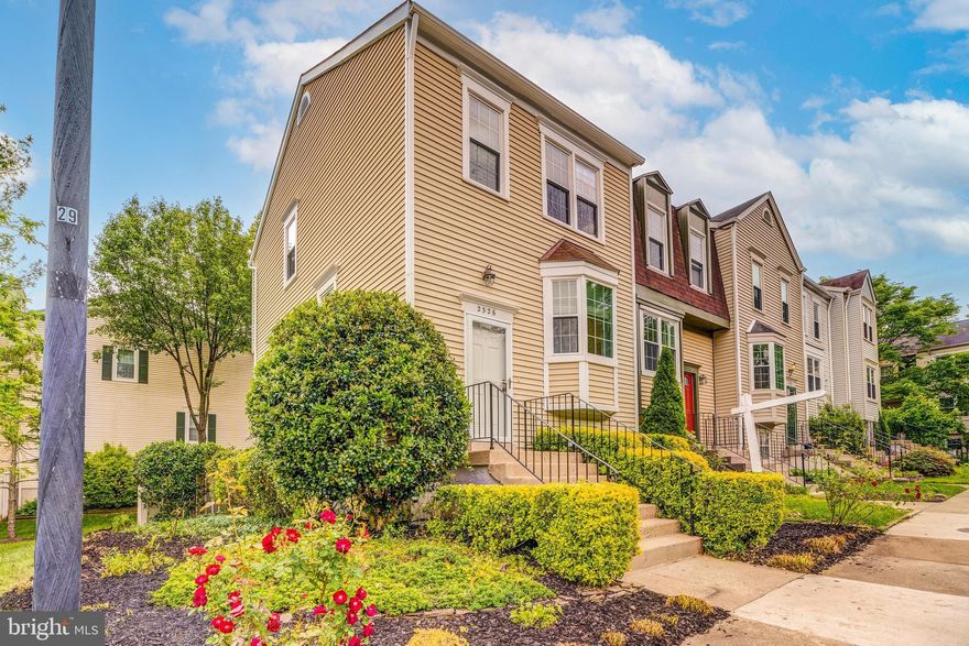 Welcome home to this fantastic end-unit townhome in Reston! Kitchen and bathrooms have been beautifully updated! Featuring a beautiful private fenced stone patio. Freshly painted with neutral colors. As you walk in you'll be greeted by an open living room filled with natural light, which leads into the dining room and updated kitchen.  As you walk up stairs you'll find  two bedrooms with two updated bathrooms attached. Beautiful sky light in the hallway allowing for all the natural light! Head down to the basement and you'll find an open basement with luxury vinyl plank and a wood burning fireplace! This space could be used as a rec room, office, third bedroom, exercise room, and it features a half bath.  Parking included!  This home is tucked away although close to everything. Enjoy all of the amenities that Reston has to offer - pools, beautiful trails, tennis courts, basketball courts, and more!  Close to committing options, grocery across the street, shops and more. Welcome home to this beautiful home!