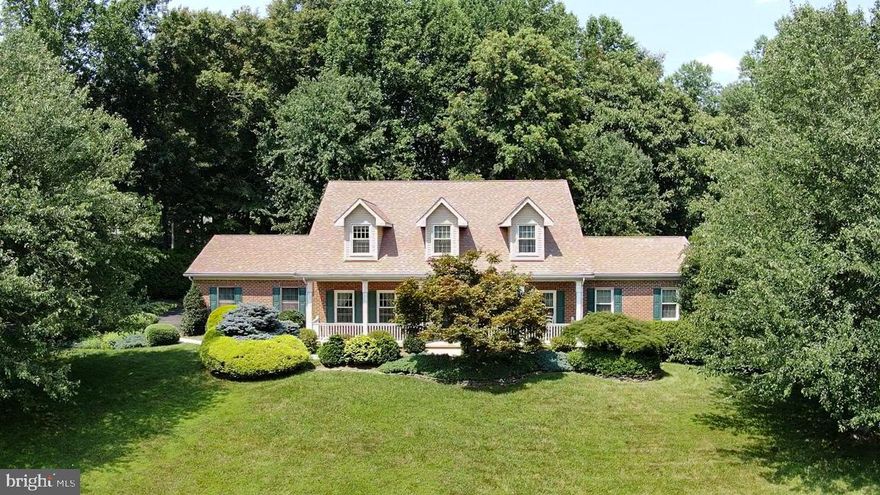 Spacious 5 Bedroom Cape Cod w/Front Porch located in Cedarday in Bel Air!  This lovingly maintained home features convenient Main Level Owner's Suite w/updated Spa Bath , Soaking Tub,  separate spacious ceramic tile Shower & Walk in Closet  w/Custom Organizer! 2 story Open Foyer leads to Formal Living Room and Formal Dining Room - all w/rich hardwood flooring. Kitchen w/granite countertops & tile backsplash opens to bright & cheery Sunroom!  Family Room has cozy natural gas brick fireplace & hardwood flooring - French door slider leads to Patio w/Pergola overlooking  peaceful view of trees & brick hardscape! Convenient main level Laundry Room.  4 Bedrooms on Upper Level and 2 additional Full Bathrooms.  Private driveway leads to sideload 2 Car Garage w/9' wide doors. Finish the Lower Level your way...there is a full bath rough-in already in place!  So much to love in this home...it won't last long!