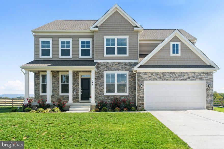 Discover a lifestyle of timeless elegance in this remarkable stone front Colonial, nestled amidst the tranquil beauty of surrounding farmland. Situated in the coveted neighborhood of Harvest Hills, this home embodies classic charm and modern luxury. The stunning light-colored interior design is complemented by a myriad of upscale features that will captivate the discerning homebuyer. As you step inside the two story foyer, you'll be greeted by luxurious LVP flooring that graces the main level, providing both durability and style. The heart of the home is the gourmet kitchen, a culinary enthusiast's dream. It boasts a huge island/breakfast bar with exquisite granite countertops, a tile backsplash, stainless appliances, a wall oven/microwave combo, and gas cooktop. The walk-in pantry ensures you have ample storage space, and the kitchen table area is perfect for casual dining. Additionally, a formal dining room awaits your more extravagant gatherings. The spacious main level offers the flexibility of a formal living room or an elegant home office, allowing you to tailor the space to your needs. The open floor plan encourages seamless flow between the living areas, providing an ideal environment for both daily living and entertaining. Retreat to the generous primary suite, a haven of relaxation and indulgence. The luxurious bathroom boasts a large, tiled shower and separate vanities, ensuring your daily routine is a spa-like experience. You'll appreciate the convenience of two walk-in closets, offering an abundance of storage space. The mostly finished basement offers an expansive rec room, plumbed for a wet bar, and room for a potential fifth bedroom, making this level versatile and accommodating. Step outside to your fully fenced backyard, an oasis that's perfect for outdoor activities and gatherings. The beautiful stamped concrete patio is an idyllic spot for dining and relaxation, and a charming gazebo adds an extra touch of sophistication to your outdoor space. Don't miss the opportunity to make this exquisite property your forever home!