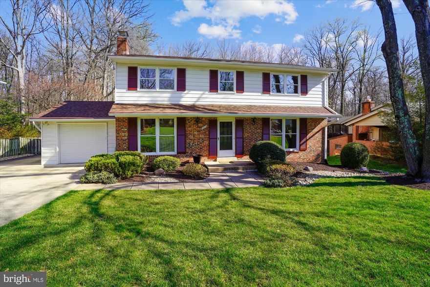 A beautiful and well maintained Yeonas Colonial in the heart of Tysons Green.This stately model was aptly named "The GENERAL” and is one of the more sought after designs in the community. The main and upper levels have excellent natural light. Featuring 4 bedrooms, 3 full baths and 1 half bath. In a superb location, with wooded views behind a privacy fenced backyard. An original fifth bedroom was converted into a spacious walk-in closet, converting the owner’s bedroom and bath into a sizable suite. New paint outside 2021 and inside 2022.
The nicely done kitchen features granite counters, stainless appliances and a brand new microwave. And the sizable walk-in pantry makes great use of the space. Featuring an expansive deck which spans the length of the home. It is accessible from both the kitchen and dining room. Hardwood floors throughout the main floor and upper level. There is a wood burning fireplace in the newly carpeted den. The beautiful Rosewood cabinet in the living room conveys with the home. The expansive deck features a pergola and bench seats. It spans the rear of the home and offers great views of the woods. The finished lower level features a walkout basement with a full bath. Privacy fencing surrounds the backyard. 
Just minutes from Tyson's Corner and downtown Vienna, the Beltway and Metro. The Spring Hill Metro Station is walk/ cycle from the home via the Vesper Trail. Easy access to I66, 495, and Dulles Toll Road. 
This home offers wonderful spaces for everyday living, entertainment and enjoying the scenic  woodland view. A Cinch Home Warranty is provided by the Seller.