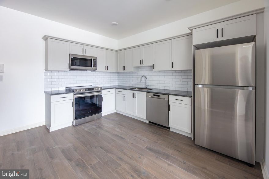 Available December 1st!  Come home to Wood Norton, nestled among the trees on a quiet block in Germantown-Mt.Airy. Convenient to  the Chestnut Hill West SEPTA line and Wissahickon Park! Your new 1-bedroom home features a fully-equipped island kitchen with custom granite countertops, stainless steel appliances, and soft-close cabinetry.  The main living area features a spacious coat closet, plus oversized windows let in beautiful natural light. Chores are a breeze with easy-to-clean wood-inspired flooring, and your own washer/dryer! Keep cool year-round with PTAC Climate control in every room. Shield your car from the elements with on-site garage parking (additional fee). Easily pay rent and submit service requests online with our resident portal. Plus, your new home is 100% pet friendly with NO PET FEES! This brand new home will not last long - apply today!