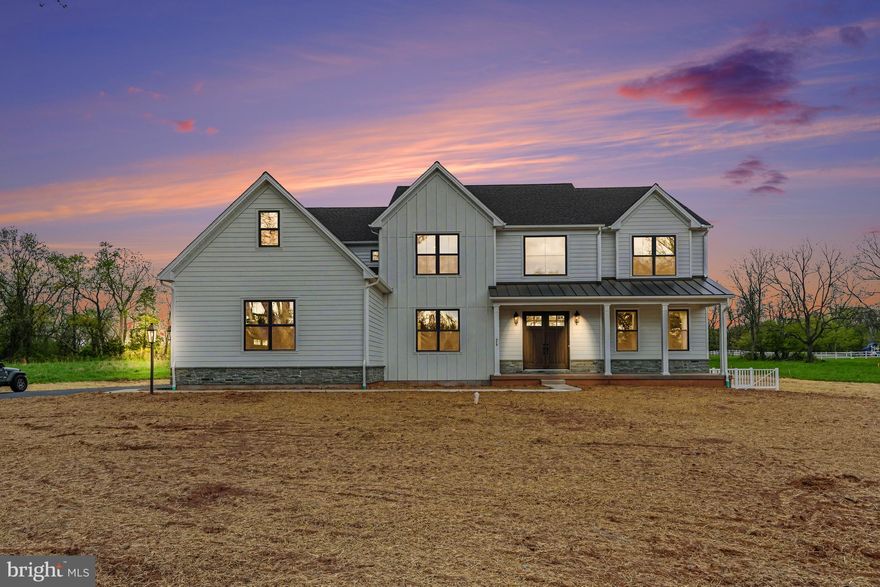 Welcome to 473 Evansburg Road, an exceptional new construction home in the heart of Skippack Township, built with unmatched craftsmanship and elevated design as the highly sought-after Ashley Model by Rotelle.

From the moment you step inside, you’re greeted by a breathtaking two-story foyer featuring a dramatic double staircase and soaring cathedral ceilings that set the tone for the elegance throughout. The foyer offers seamless access to a formal dining room—perfect for hosting—or invites you to flow into the spacious living room.

Designed with both everyday living and entertaining in mind, the open-concept main living area effortlessly connects the living room, family room, and kitchen. The family room is a true showstopper, anchored by a stunning floor-to-ceiling stone fireplace that brings warmth and character to the space. The chef’s kitchen is equally impressive, boasting stainless steel appliances, a striking blue subway tile backsplash, and direct access to a butler’s pantry complete with additional cabinetry, prep space, and a walk-in pantry for maximum storage and functionality.

Just off the main living area, the sunroom offers the perfect extension of your living space, filled with natural light and providing direct access to the backyard—ideal for indoor-outdoor living and entertaining.

The main level also features a private first-floor bedroom with an en suite bath, walk-in shower, and spacious walk-in closet—ideal for guests, in-laws, or flexible living arrangements. A stylish powder room completes the first floor.

Upstairs, the luxurious primary suite offers a true retreat, featuring a spa-like en suite bath with a soaking tub, walk-in shower, and double vanity. Three additional generously sized bedrooms are complemented by a convenient Jack-and-Jill bath, along with another full bathroom and a second-floor laundry room for ultimate ease and efficiency.

Throughout the home, you’ll find abundant natural light, recessed lighting, and thoughtful design elements that highlight the superior quality and attention to detail that Rotelle is known for.

Set on a property that offers ample outdoor space with both front and back yards, this home provides the perfect balance of luxury, comfort, and room to enjoy the outdoors.

This is not your average new build—this is a fully upgraded, move-in-ready masterpiece where every detail has been carefully curated.