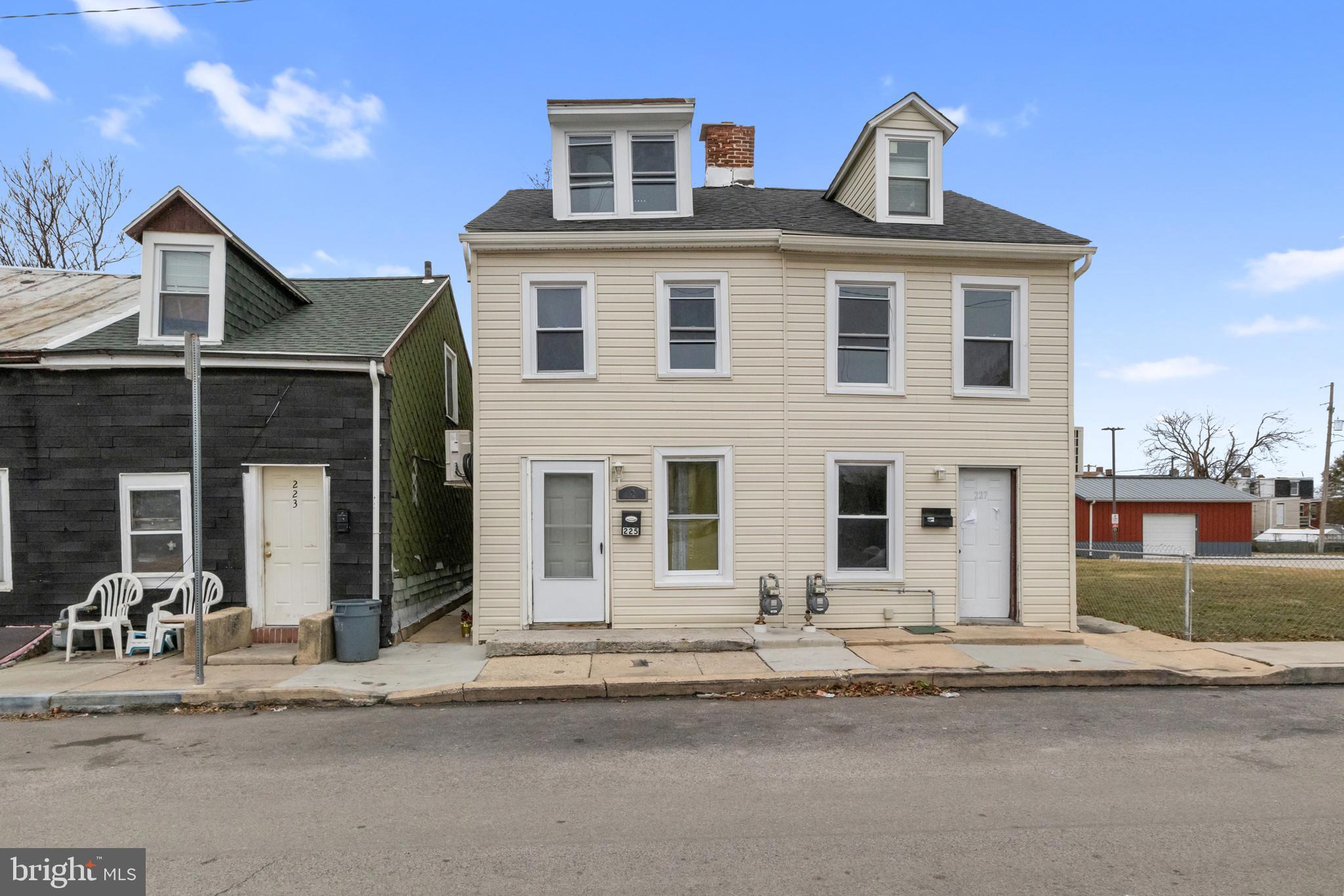 Welcome to 225 E South St, an affordable and move-in-ready home in the heart of York City! Step inside to a spacious living room featuring durable vinyl flooring, providing both style and easy maintenance. The separate dining area offers a comfortable space for meals and gatherings. Upstairs, the primary bedroom is conveniently located on the second floor, adjoining the full bathroom for added privacy. Need extra space? The finished attic serves as a versatile bonus room—perfect as a second bedroom, office, or cozy retreat. Outside, the fenced-in backyard provides a private space ready for your personal touch—ideal for gardening, relaxing, or entertaining. With easy access to schools, shops, and public transportation, this centrally located home is close to everything York City has to offer. Property is no longer tenant occupied and back on market! All carpets in the home have been replaced, all tenant belongings removed, and home has been professionally cleaned. Previous buyer's home inspection available upon request!