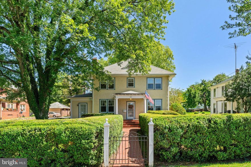 This charming home in Old Town Warrenton, is a true gem with its traditional four square design and enclosed porches that offer additional living space.  The backyard is fully fenced for privacy and contains beautiful gardens and an adorable potting shed.  Located so closely to Main St, it's easy to access the restaurants, shops and town activities.
Inside, the home exudes warmth and character with hardwood flooring throughout most of the home.  The living room contains a gas burning fireplace.  Located just off the living room is a cozy reading nook with built-in bookcases, which makes for a perfect place to kick back and relax with a book.  The butler's pantry is located between the dining room and kitchen and has a built in table and benches that provide both charm and additional storage.
Upstairs, the primary suite offers a walk in closet and an on-suite,  two additional bedrooms and a fully renovated hall bath.  There is a walk up attic which provides additional storage.
This home boasts plenty of off-street parking and an oversized single car garage for convenience.
With all major systems replaced within the past 10 years, this home is not only full of charm but also ready for its new owner to move in and enjoy.  Don't miss out on the opportunity to own this lovely Old Town Warrenton home with its unique features and inviting atmosphere.