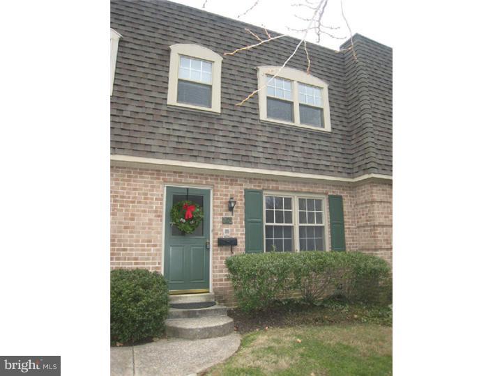 Location, Location!!  3 BD/2.5 BA Radnor Twp. townhouse in sought-after "walk-to" Wayne! Nestled in a quiet, well-maintained community, this home boasts classic features including wood floors on 1st & 2nd fl., crown molding, graceful turned staircase, and Living Room w/fireplace. Dining Room has expanded opening to Kitchen & sliders to an upgraded, fenced brick patio. 1st fl. Powder Rm. Kitchen has white cabinets, blue solid surface counters with mirrored back-splash, and a window. 2nd floor has Master Bdrm with walk-in closet & Master BA with stall shower, 2 add'l hall bedrooms, Hall BA with tub, & linen closet. Panelled Lower Level Rec Room has loads of recessed lighting & is ideal for recreation or exercise. Large Laundry/Storage room has ample built-in shelving. EZ parking right out the back door! Fabulous, convenient location within easy strolling distance of schools, train, parks, biking/hiking trail, and shops & restaurants in downtown Wayne.
