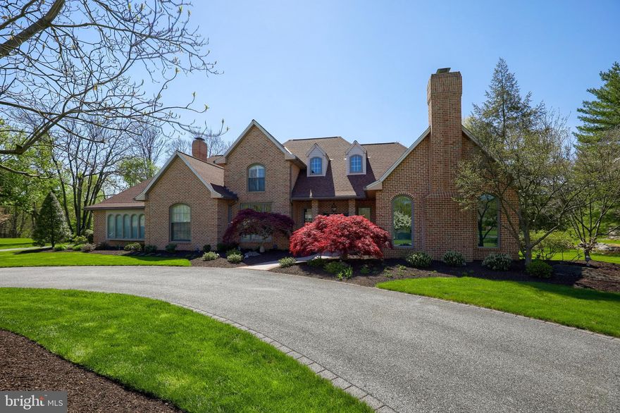 Luxury living at it's finest in this beautifully updated Waterfront Estates property. Boasting nearly 9,000 square feet of finished living space and situated perfectly along picturesque Mill Creek, this home is just minutes from all of Lancaster's conveniences while feeling a world away. You will love the special touches that the brand new kitchen features. Such as: custom Amish made cabinetry by Manny Beiler, Viking appliance package with huge range, double wall oven and refrigerator, butler's station with beverage fridge, commercial ice maker and glass mullion wall cabinets with custom lighting. The focal point and main gathering place will be the huge 12 foot granite island that offers the perfect place to serve guests or work on projects. The open concept kitchen flows into a spacious family room with fireplace and 10 foot coffered ceilings. Tons of windows bring a flood of natural light through the home while offering sweeping views of your large in-ground pool and private natural setting.  The heated pool was just resurfaced and coped and features an electric retractable safety cover. The home's daylight finished lower level walks out to the pool and features a 2nd kitchen, full bath, huge game/billiards room and large family room. There is also an exercise room and sauna for added fitness options. On the 2nd floor you will find 3 spacious bedrooms, a bonus room, and a playroom/nursery with "secret"  spiral staircase access to the expansive first floor owner's suite.  This beautifully updated property offers a location and setting that is unmatched. Whether you love to entertain or prefer quiet and tranquility, this home will offer it all!