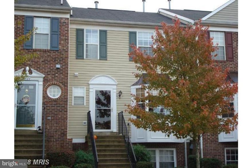 Attractive townhome in Crofton, walk to pool, schools, and near to great shopping. A must see.  Large deck, fenced in area, open kitchen with upgraded refrigerator, gas fireplace, cathedral ceilings in MBR.  Owner can move soon!  Come and see!