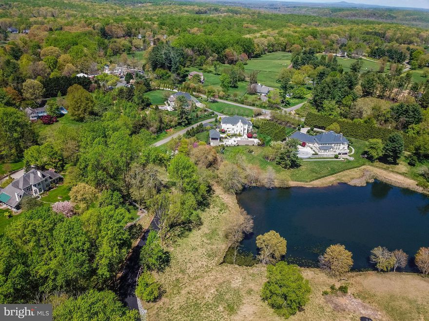 Build your luxurious dream home on this secluded five-acre lot within the prestigious Creek Stone Pond community, offering private water access and picturesque views in the sought-after Langley School District. This parcel comes with approved plans for a grand 9,700+ square foot luxury residence. The building permit was duly issued in May 2020, and a 20-foot-wide asphalt driveway has already been constructed, leading directly to the lot. Additionally, a well has been installed, and both electric and gas connections are conveniently available nearby. This tranquil property presents an exclusive opportunity for discerning buyers to bring their vision of opulent living to life. Arrange a private tour of this exceptional property today.
