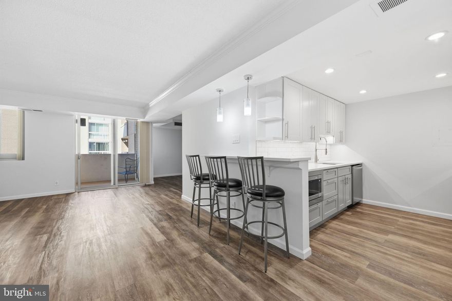 Welcome to the 11th floor, a wonderful sunlit, bright and spacious South view unit in The Elizabeth.  Renovated and cared for since; this condo is awaiting it’s next owner.  The kitchen boasts stainless steel appliances, under cabinet lighting, plenty of storage and counter top dining.  
You’ll love the versatility of the living area. The nook offers endless possibilities with so much room for activities! Use it as an office, den, library, dining room and the list goes on… 
Some unique features of this unit are that the washer and dryer are in their own closet making for a quieter living experience. The bedroom is separated by double doors closing it off as a suite complete with walk-in closet.  The extra half bath comes in handy for entertaining because with lush green aerial views how can you not?!?   Unit comes with 1 dedicated garage parking spot as well as garage guest parking.  

The building is full service with a 24/7 concierge, indoor pool, sauna, guest parking and a fitness center. There are also several common spaces to enjoy, including indoor and outdoor lounge areas, a party room, library, and meeting room. Shoot over to D.C. or MD in minutes with a short stroll or community shuttle that runs to the Friendship Heights Metro. Also within the building is a bodega that makes a great burrito! Located just walking minutes from restaurants, shops, Whole Foods, Metro, bus stops and others along Wisconsin Avenue.