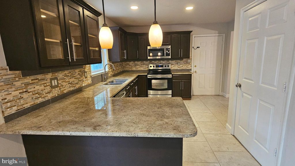 Photo of 228 Thunderbird Drive, LUSBY, MD 20657 (MLS # MDCA2023202)