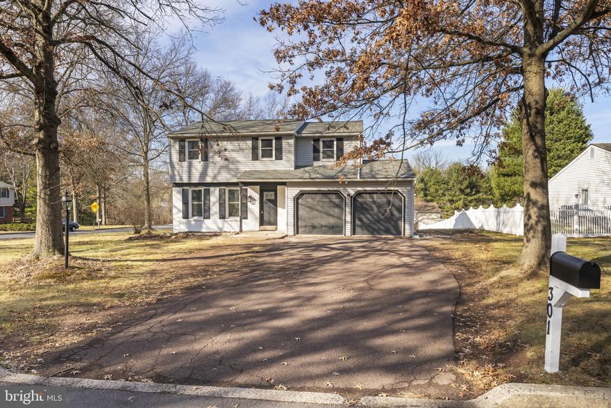 Welcome to this stunningly renovated 4-bedroom, 2.5-bath Colonial in desirable Hilltown Township! This home boasts brand-new windows, doors, and garage doors with openers, along with beautiful new bathrooms. The brand-new kitchen is a true showstopper, featuring quartz countertops, a stylish quartz backsplash, under-cabinet lighting, and elegant crown molding.  Kitchen has new stainless steel appliances including the dishwasher, radiant top range, refrigerator, and wine refrigerator.  Recessed lighting and new flooring add a modern touch throughout. The fully finished basement provides additional living space with recessed lighting perfect for entertaining or relaxing.  Rear covered deck.  With everything updated and move-in ready, all that's left to do is pack your bags! Don’t wait—schedule your showing today!