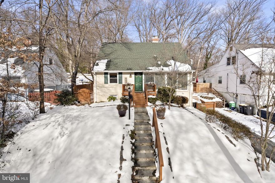 Welcome to this gorgeous Cape Cod-style home, nestled on a wooded lot with beautiful gardens in the heart of Hyattsville, MD. The charming front exterior features flagstone steps, inviting you into a home where timeless elegance meets modern comfort. The open floor plan is filled with natural light from floor-to-ceiling front windows, while crown molding, wainscoting, gorgeous hardwoods, and a stunning chandelier add classic charm.  The updated kitchen boasts new cabinets, sleek hardware, an overhead range hood, a gas stove, and stainless steel appliances. An expanded rear addition with Pella windows offers extra living space, complete with built-in cabinetry, perfect for a coffee or prep station when hosting friends and family.   

The main level features a freshly repainted primary bedroom adorned with a sleek, modern chandelier and custom-built closet space. Completing this level are a second bedroom and a fully remodeled bathroom. Upstairs, the second floor offers two generously sized bedrooms, a walk-in closet, and an additional full bathroom, providing ample space and comfort.

This home has been thoughtfully updated, including fresh interior paint, White Oak LVP flooring, and a rebuilt, fireproofed chimney in 2022. The master bathroom was fully renovated in 2023, and in 2024, recessed lighting, a basement mini bar, and upgraded wooden stairs were added. Additional highlights include a cozy gas fireplace,  and a private driveway with space for two cars.

The fully fenced, 11,326 sq. ft. backyard is a serene oasis, complete with two patios, one with a fire pit, and surrounded by tall oak and maple trees, azaleas, hydrangeas, and other perennials. An Amish-built shed provides additional storage for lawn equipment. The beautifully finished basement features ceramic tile floors, built-in shelving perfect for an office or second living room, an under-stairs storage area, and a laundry room.  A separate tool and workroom, complete with a heavy-duty workbench, offers ample space for your projects. The home also boasts a six-year-old shingle roof and a complete French-drain system with an interior sump pump and battery backup, ensuring a dry basement.

Situated just steps from Edgefield Park, residents can enjoy a children’s play area, tennis courts, basketball courts, picnic spots, and walking trails. The home is also conveniently located near major commuter routes, including Powder Mill Road, I-95, the Intercounty Connector, and the Beltway. A neighborhood bus stop is within walking distance, and Metrorail is only a 10-minute drive. Shopping is nearby at Powder Mill, New Hampshire Avenue, White Oak Shopping Center, and College Park. For professionals, the U.S. Army Research Laboratory is a short walk away, the FDA is a 5-minute drive, and the new Adventist Hospital at White Oak is only 10 minutes away.

This home offers more than just a place to live—it provides a lifestyle of comfort, convenience, and natural beauty. Don’t wait to make it yours—schedule your showing today and experience everything this exceptional property has to offer!