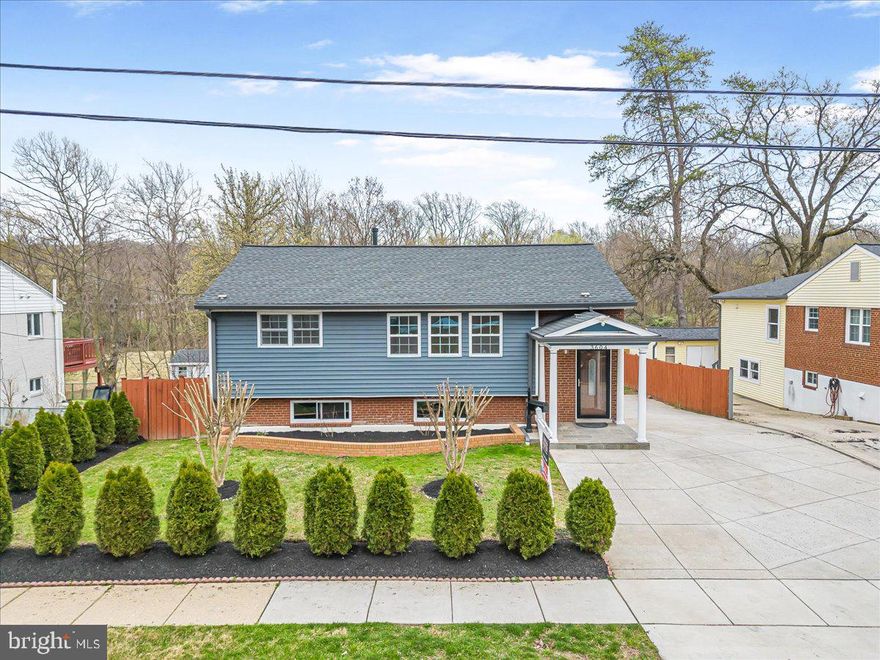 Welcome to this beautifully renovated home in Silver Spring! Throughout the main living areas, hardwood floors and recessed lighting create an inviting atmosphere, while large windows fill the space with natural light.  This home also features a brand new HVAC system! The main kitchen features sleek quartz countertops, stainless steel appliances, and updated finishes, perfect for everyday living and entertaining. The home includes three spacious bedrooms and two full baths, offering comfort and functionality for a variety of lifestyles.  The fully finished walk-out basement expands the living space with its own kitchen and private entrance. Step outside to a full-sized deck with direct access to the backyard, where a spacious shed provides ample storage.  A large driveway offers plenty of parking, and the location is just minutes from state parks and scenic trails, as well as popular restaurants, shopping, and more. This Silver Spring home is fully updated and designed for comfortable, modern living!