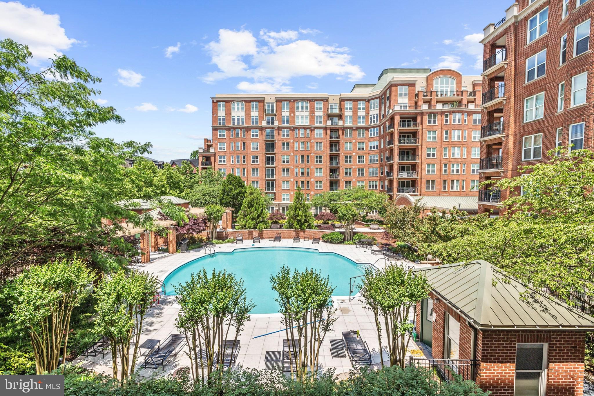 Luxury Living in this sun-drenched South Tower unit with POOL and verdant garden views...including the treetops of Virginia! INCREDIBLE VIEWS from the 9th floor! And Unit 909S is extra special with 10 ft Ceilings...yes...10 Feet! The unit is flooded with abundant Natural Light..forget the lamps!
The freshly painted sought after Lancaster model is treasured for its spacious footprint including a 5ft x 17 ft covered balcony with dual access from the primary bedroom and entertaining areas. Why is this unit extra special? It’s the perfect combination of elegance and convenience and includes TWO bedrooms at opposite ends of the home for privacy, TWO full bathrooms PLUS DEN and a cozy electric fireplace (2024) which is a rarity and a highly desired feature at Park Potomac Place. The new Buyer will enjoy the large bathrooms and chef's kitchen. The kitchen features Viking appliances including a gas cooktop, wall ovens and microwave (2024) and a Subzero refrigerator. The walk-in primary bedroom closet is one of the two large closets for clothing storage. A true laundry room (washer and dryer 2017) completes the perfect home for downsizing at Potomac’s NUMBER ONE condo community. The HVAC and Hot Water (2016) is located in a separate utility closet outside the unit (extra quiet) The unit conveys with not one BUT TWO generous parking spots located on the entry level off of the lobby AND an enclosed private storage room conveniently located INSIDE the building on the lobby level.
Why is Park Potomac Place the finest of all condominium buildings in the DMV? It is the best managed full-service establishment which provides its residents with 24-hour concierge, on-site management, building engineer, porter service, professionally landscaped grounds and hardscape, elegant clubroom with catering kitchen, private courtyards and grills, an outdoor pool, fitness center, guest suites, and guest parking and shared EV charging stations…..and the one of the lowest condo fees of the luxury buildings in DMV area. Residents enjoy the convenience of a great collection of retail businesses, gourmet coffee shops, banks, grocers, pharmacy, and the best dining establishments of Potomac including Founding Farmers, Gringos & Mariachis, the new popular King Street Oyster Bar, Attman’s Deli, Brooklyn’s Deli, O’Donnell’s Fish Market, Yirasai Sushi, Pama Thai and the Coming Soon Gregorios; with direct access to I-270 and commuter routes to Bethesda, Downtown DC, Virginia and three international airports! Look no further…the best living in Potomac…and maybe all of the DC metropolitan area!
THIS IS THE ONE!