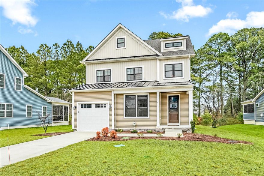 Embrace the best of beach and canal living in this beautifully crafted coastal retreat, ideally positioned near the back of the community of Stingray Harbor for added privacy, yet just minutes from Bethany Beach and the Boardwalk. Enjoy easy access to local restaurants, mini golf, ice cream shops, walking trails, and kayaking along the Assawoman Canal, all while coming home to a peaceful, tree-lined setting.

With 5 bedrooms and 4 full bathrooms, this home offers the space and flexibility today’s buyers are looking for. The main level features a spacious owner’s suite with a tray ceiling, generous walk-in closet, and spa-inspired bathroom complete with dual vanities and a striking Roman walk-in shower. An additional first-floor bedroom and full bath provide ideal accommodations for guests, while a well-appointed laundry room with a utility sink and folding counter adds everyday convenience. Upstairs, a bright and versatile loft connects three additional bedrooms and two full bathrooms, including a convenient Jack-and-Jill layout.

The heart of the home is a light-filled great room designed for gathering and entertaining. Expansive windows and a sliding door create a seamless connection to the outdoors, while the gourmet kitchen impresses with quartz countertops, a large center island, a gas range, a farmhouse sink, a tiled backsplash, a walk-in pantry, and abundant cabinetry.

Step outside to a screened porch and beautifully hardscaped patio overlooking the spacious backyard, surrounded by mature trees, an inviting space for outdoor dining, morning coffee, or unwinding after a day at the beach.

Located in the desirable community of Stingray Harbor, residents enjoy access to scenic walking trails and paddleboarding or kayaking along the canal. A quick bike ride brings you into the heart of Bethany Beach, where shopping, dining, and sandy beaches await.

Move in, settle back, and start living the coastal lifestyle you’ve been waiting for. Offered fully furnished, this home delivers a truly turnkey experience.