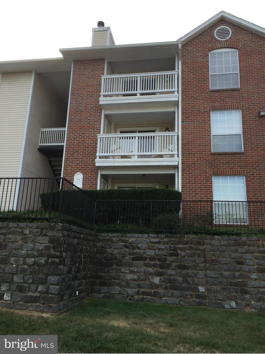 Price Adjustment! Beautiful condo in Tysons! Top floor with cathedral ceiling and great view! Largest 1-bedroom garden unit. Many updates - gorgeous wood floors.  Wood burning fireplace, separate laundry room with full-size, front-load washer and dryer, extra-large storage closet on balcony.  Reserved parking.  Walk to metro, Starbucks, Harris Teeter and more! Anything you want, Tysons has it all!