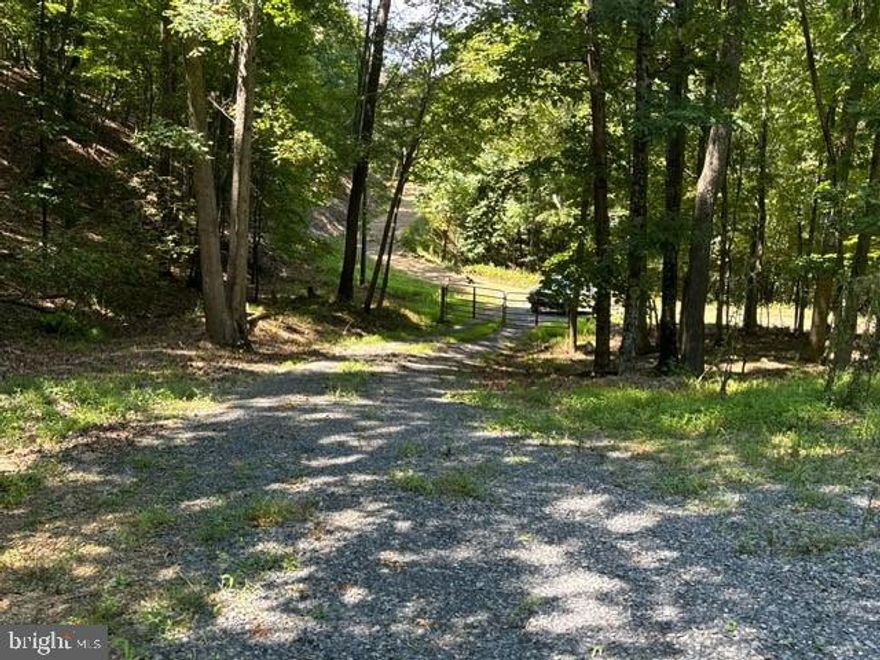 TURN KEY, FOR REAL, WELL, SEPTIC, ELECTRIC, AND A ROAD LEADING TO THE BUILDING SITE  MAKE THIS PROPERTY EVEN MORE APPEALING FOR FAST, EASY STARTUP AND IMMEDIATE USE. WHAT MORE CAN YOU ASK FOR SATISFACTION GUARANTEED LORD WILLING AND THE CREEK DON'T RISE YOU'LL GET HERE BEFORE THIS GETS SWEPT AWAY...NEARBY PUBLIC ACCESS TO THE SOUTH BRANCH OF THE POTOMAC RIVER MAKES IT EVEN BETTER FOR FISHERMAN, CANOERS & KAYAKERS. IF YOU LIKE HUNTING, SHOOTING, AND TRAIL RIDING, THIS HAS IT ALL. GENTLY ROLLING HILLS AND VALLEYS WITH SPACIOUS HARDWOODS OFFER EASY ACCESS THROUGHOUT THE ENTIRE BOUNDARY LINES OF THE PROPERTY. IF SEEING IS BELIEVING, SCROLL THROUGH THE PICTURES; THEY ARE AS REAL AS REAL CAN GET. IF YOU DON'T BELIEVE ME, TAKE AN EASY TRIP OUT AND VIEW IT FOR YOURSELF. YOU'LL BE GLAD YOU DID. DON'T WORRY BE HAPPY.