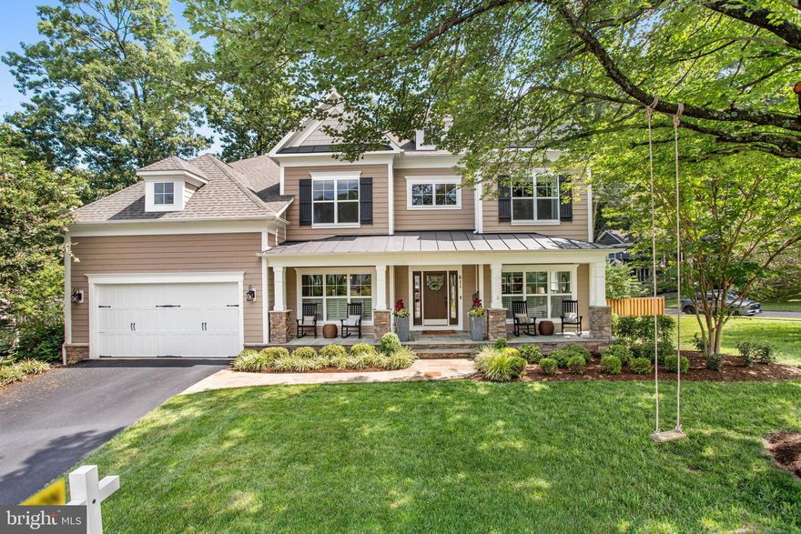 Welcome to this beautiful one-of-a-kind Craftsman-style home in the highly sought after Vienna Woods neighborhood featuring 6,000 square feet of living space across three levels, on a rare oversized one-third-acre corner lot. A spectacular residence that offers a blend of elegance, comfort, and timeless craftsmanship. This home boasts three finished levels - 5 bedrooms and 4 1/2 baths. The open main floor includes high ceilings, a designer kitchen, an oversized island perfect for entertaining, custom cabinetry, quartz countertops, and a generous walk-in pantry. As you step inside, you'll be immediately captivated by the attention to detail and the exquisite architectural elements that define this home. The main level features an open-concept design, allowing for seamless flow and an abundance of natural light. The spacious family room with its cozy fireplace and the formal dining room set the stage for unforgettable entertaining experiences. The heart of this home is undoubtedly the stunning gourmet kitchen with its many high-end features and openness to the main living area. It is a chef's dream, equipped with high-end Wolf and Subzero appliances, a generous quartz center island, walk in pantry and large dining area. Whether you're hosting a large gathering or preparing a meal for your loved ones, this kitchen will inspire culinary creativity. Adjacent to the kitchen and eating area are the spacious and bright family room and a large formal dining room perfect for family gatherings and entertaining special friends and guests. The large first floor office is the perfect productive work from home space that features bright natural light and beautiful custom built-in bookcases. Step outside into the beautifully landscaped, private, flat backyard, where you'll find a spacious deck and flagstone patio area perfect for al fresco dining or simply unwinding after a long day. The professionally designed landscaping creates a serene ambiance, offering a peaceful escape from the hustle and bustle of everyday life. The upper level of this home is dedicated to tranquility and privacy. The luxurious primary suite is a true owner's retreat, complete with a generous sitting area, and a spa-like en suite bathroom featuring dual vanities, a soaking tub, and a spacious walk-in shower. Three additional well-appointed bedrooms and two beautiful full bathrooms provide ample space for family and guests. The large finished lower level with walk-up stairs to the rear yard features a fifth bedroom and full bath along with a very spacious club/rec room for additional entertainment options. This home boasts an amazing walk-able location, close to the town center with quaint shops, wonderful dining, Vienna Community Center and W&OD Trail. Vienna Elementary, Thoreau Middle School, and Madison High School pyramid. Don't miss this incredible opportunity to own a truly exceptional home that seamlessly blends craftsmanship, style, and modern amenities. Schedule your private showing today and prepare to be amazed by everything this remarkable residence has to offer.